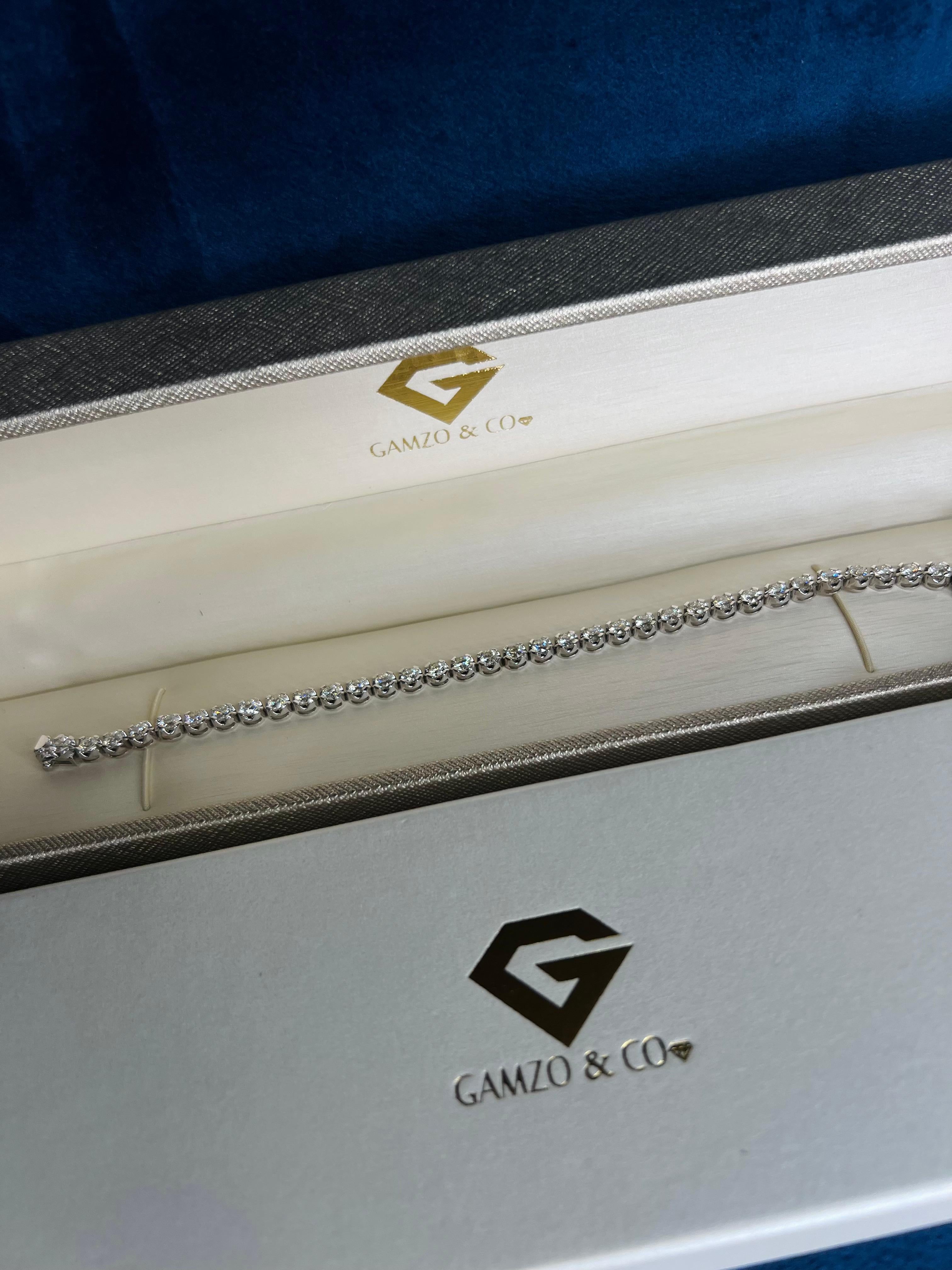 These beautiful round diamonds dance around your wrist as they absorb light and attention.
Metal: 14k Gold
Diamond Cut: Round
Diamond Total Carats: 5ct
Diamond Clarity: VS
Diamond Color: F
Color: White Gold
Bracelet Length: 6 Inches 
Included with