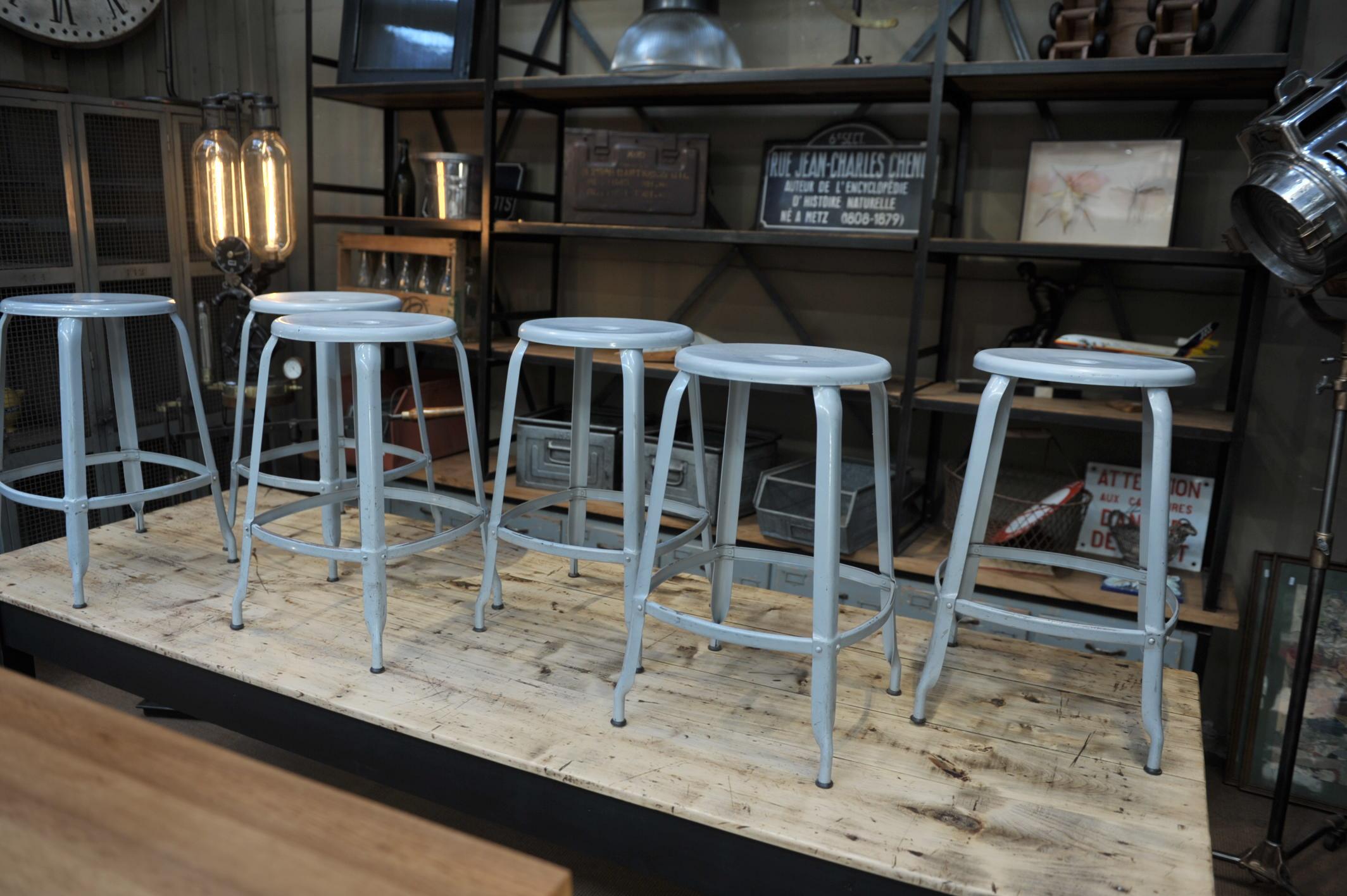 6 French riveted Iron factory stack able grey stools by 