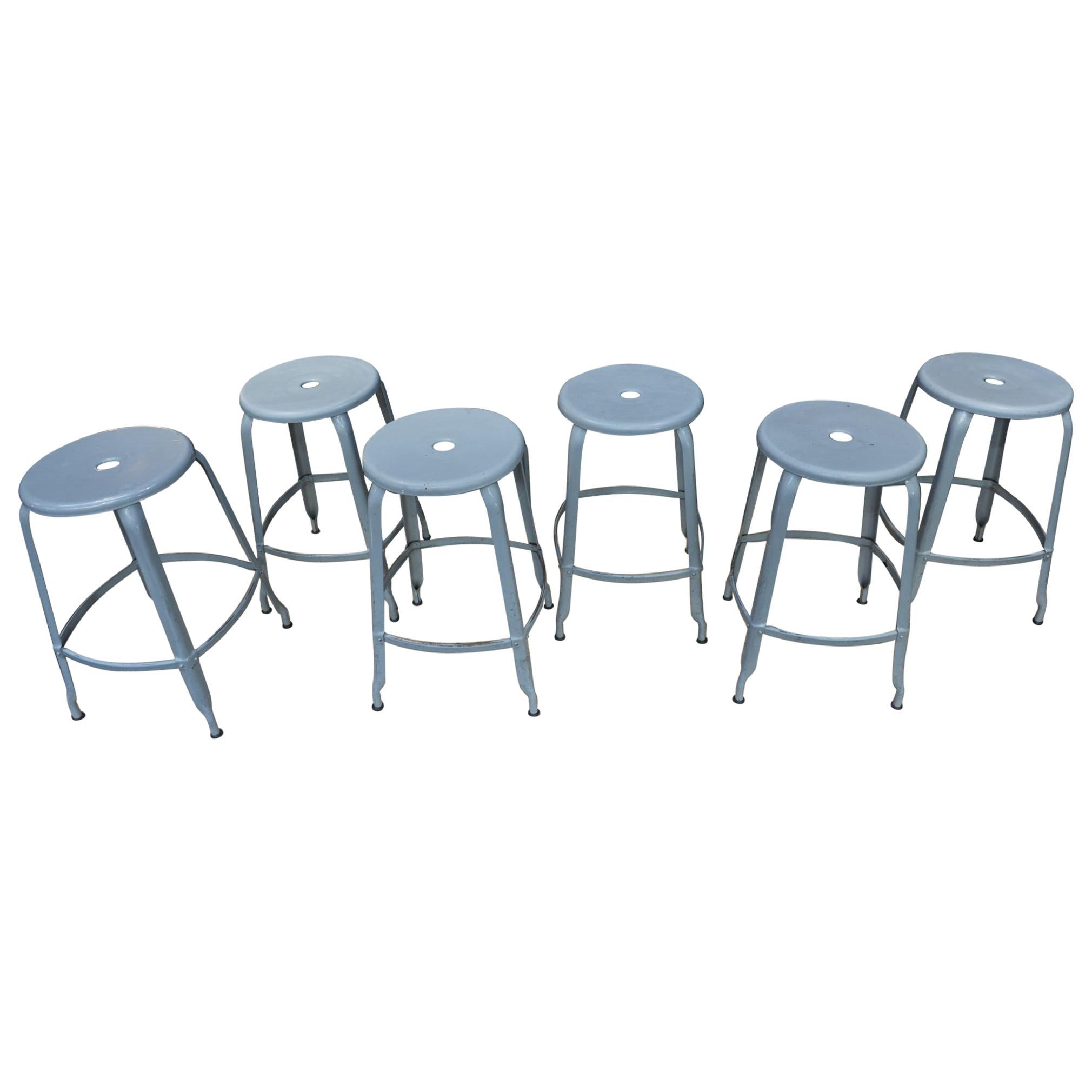 6 Iron factory Stools by "Nicole", France, circa 1950 For Sale