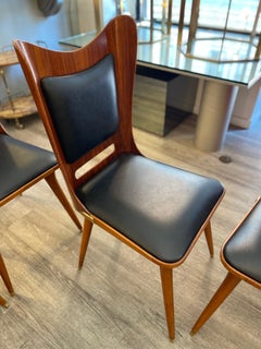 6 Italian wooden chairs from the 1950s, featuring leather and brass details
