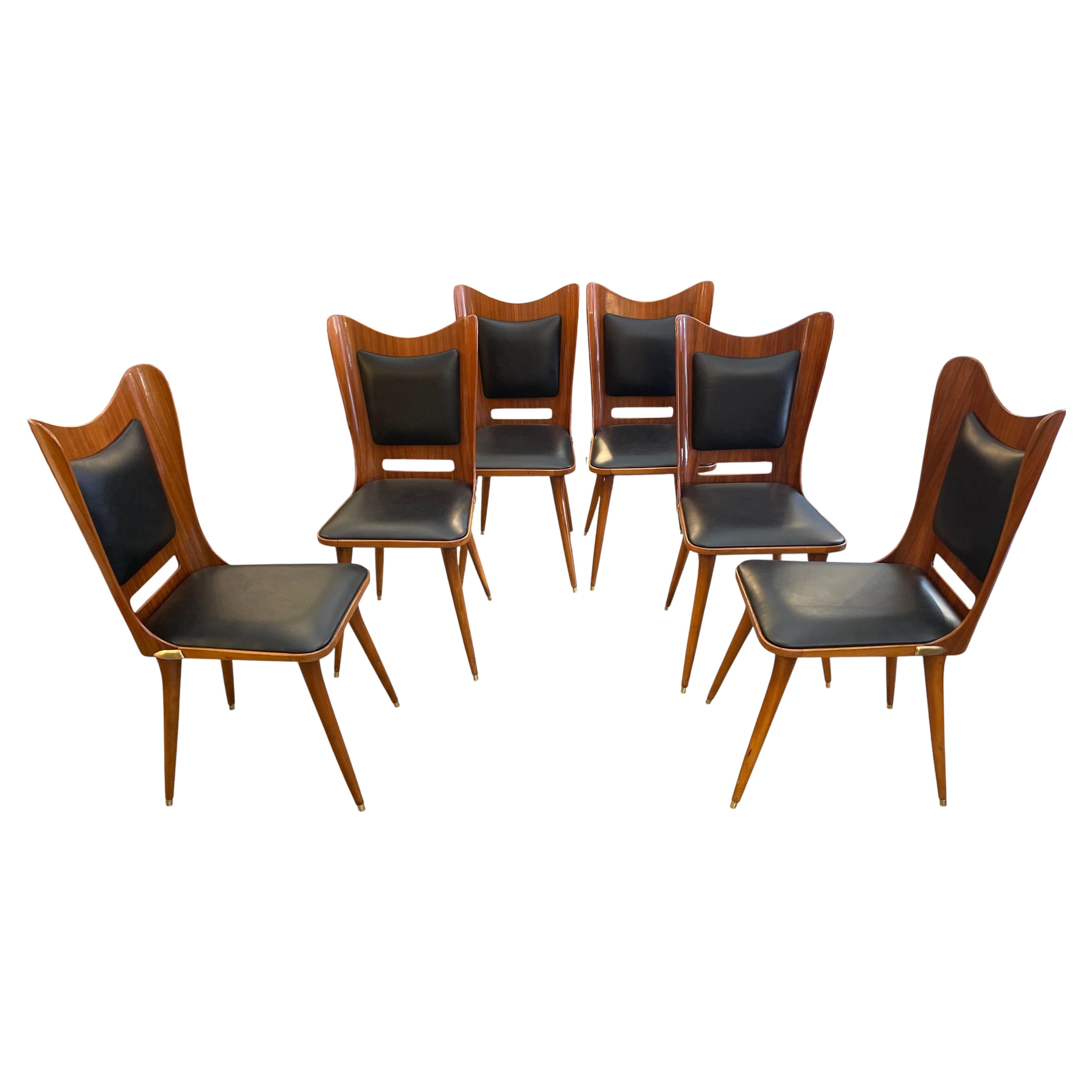 6 Italian wooden chairs from the 1950s, featuring leather and brass details For Sale