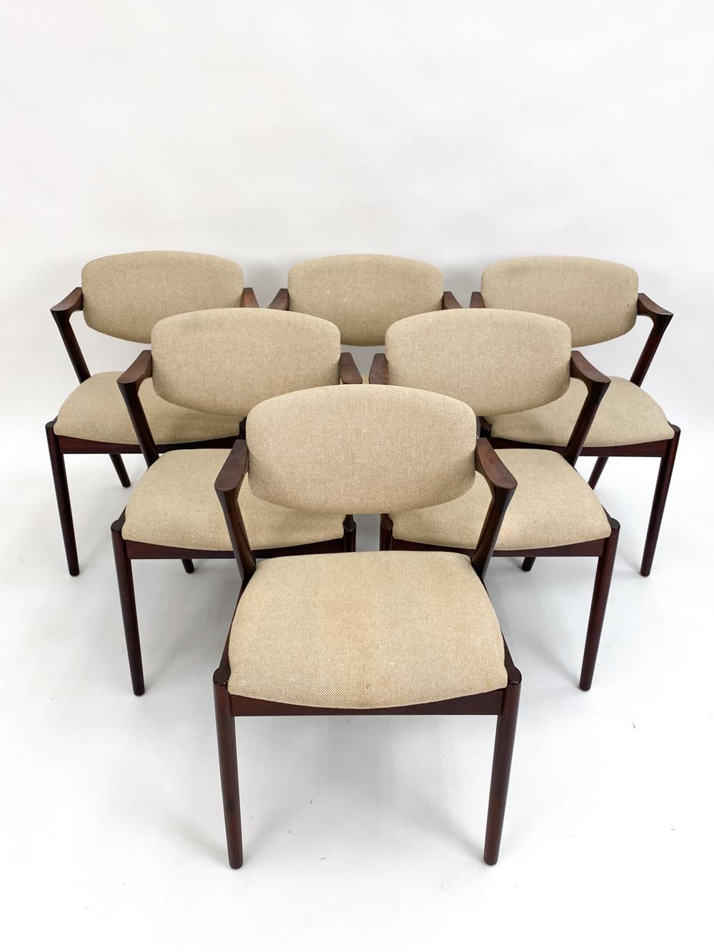 Introduce your living space to the epitome of Danish design mastery with this set of six Model 42 