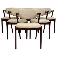 (6) Chaises de salle à manger Kai Kristiansen modèle 42 "Z" en chêne teinté foncé, vers les années 1960