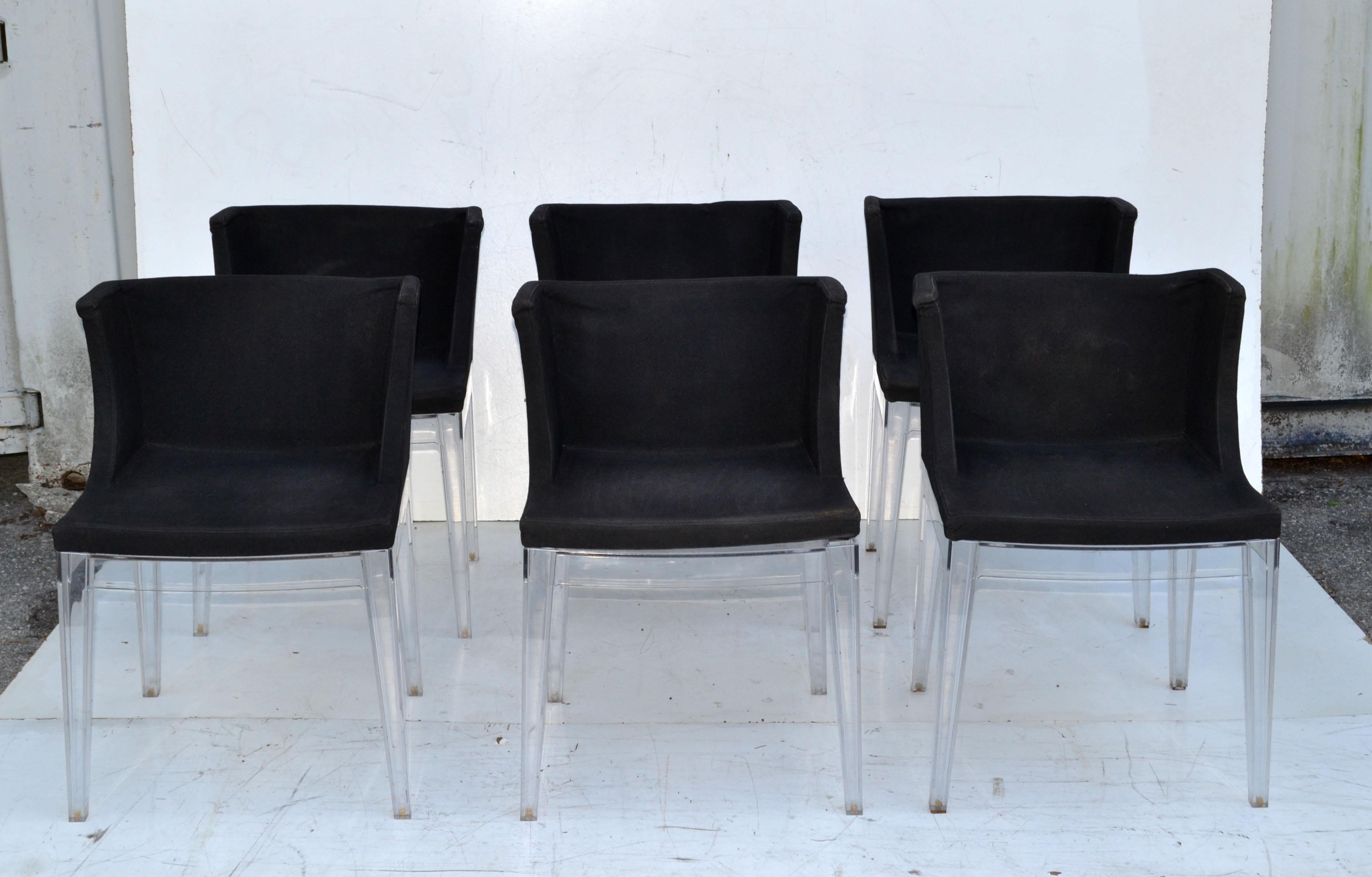 Vintage Set of 6 Mademoiselle dining or armchairs in the original black cotton upholstery and with transparent Lucite frames.
Designed by Philippe Starck and made in Italy by Kartell in the 1970.
All original condition with wear to the foot glides