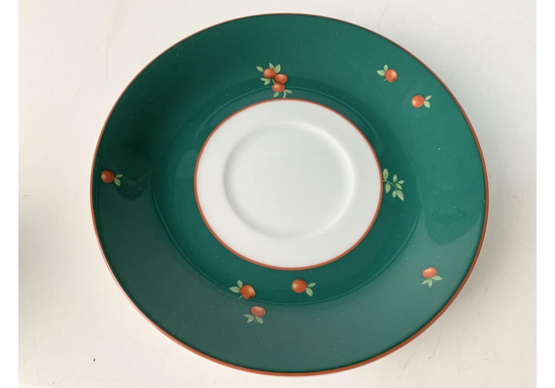 Le Cirque expresso cup with over-sized saucer for placement of biscuit or cookies. Made by Sasaki Japan and decorated in USA. Green banding with monkeys and fruit.
Dimensions: 
Cups - 2 1/2