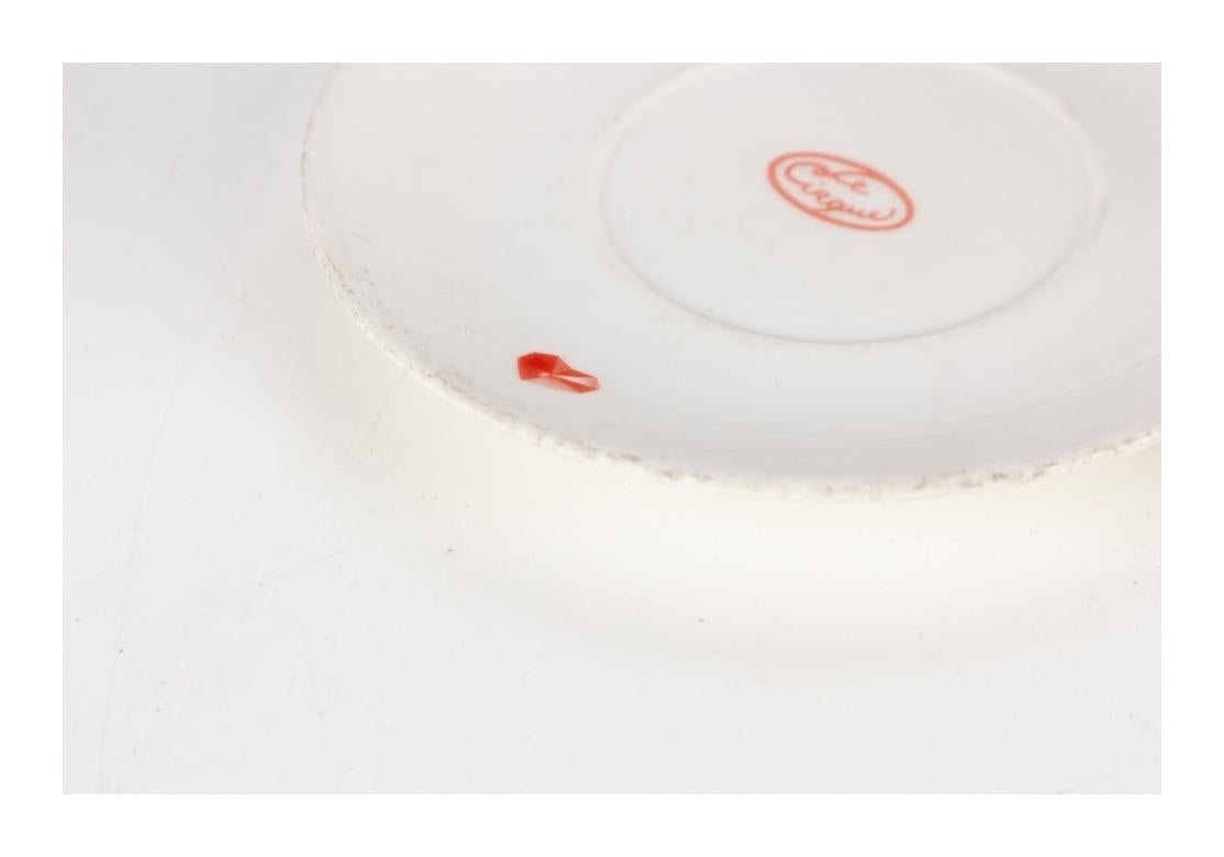 Le Cirque gems cups and saucers with white porcelain cups decorated with hanging gems, the saucer with Le Cirque logo in center and gems on border. Can be used for coffee or tea or a larger espresso cup.
Custom made for Le Cirque by Villeroy & Boch