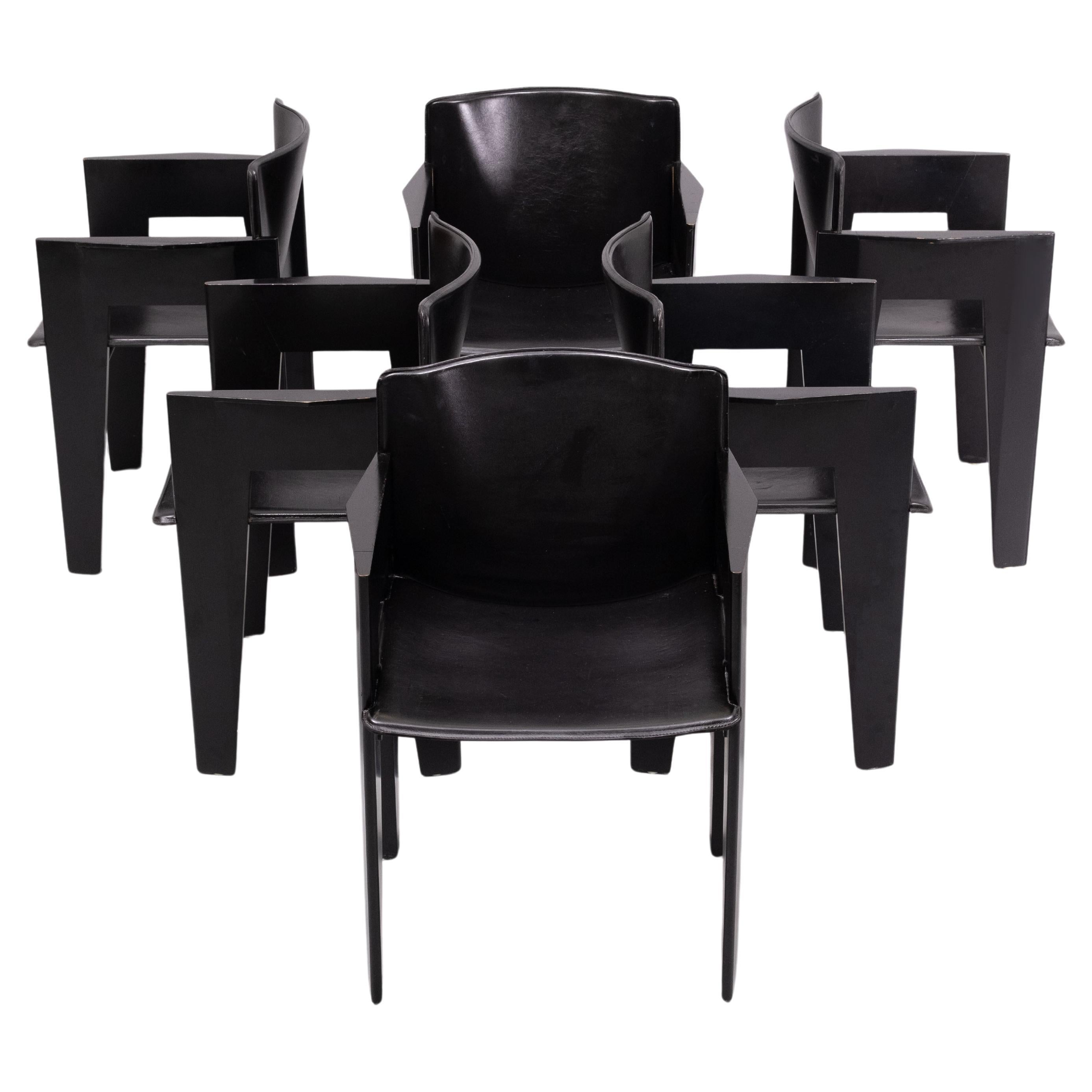 6 Postmodern chair by Arco, The Netherlands, ebonized oak and saddle leather chairs, 1980s unusual armchair designed by a Dutch architect. Sculptural and elegant appearance mixed with quality materials make these a great design.   Armrest height 66