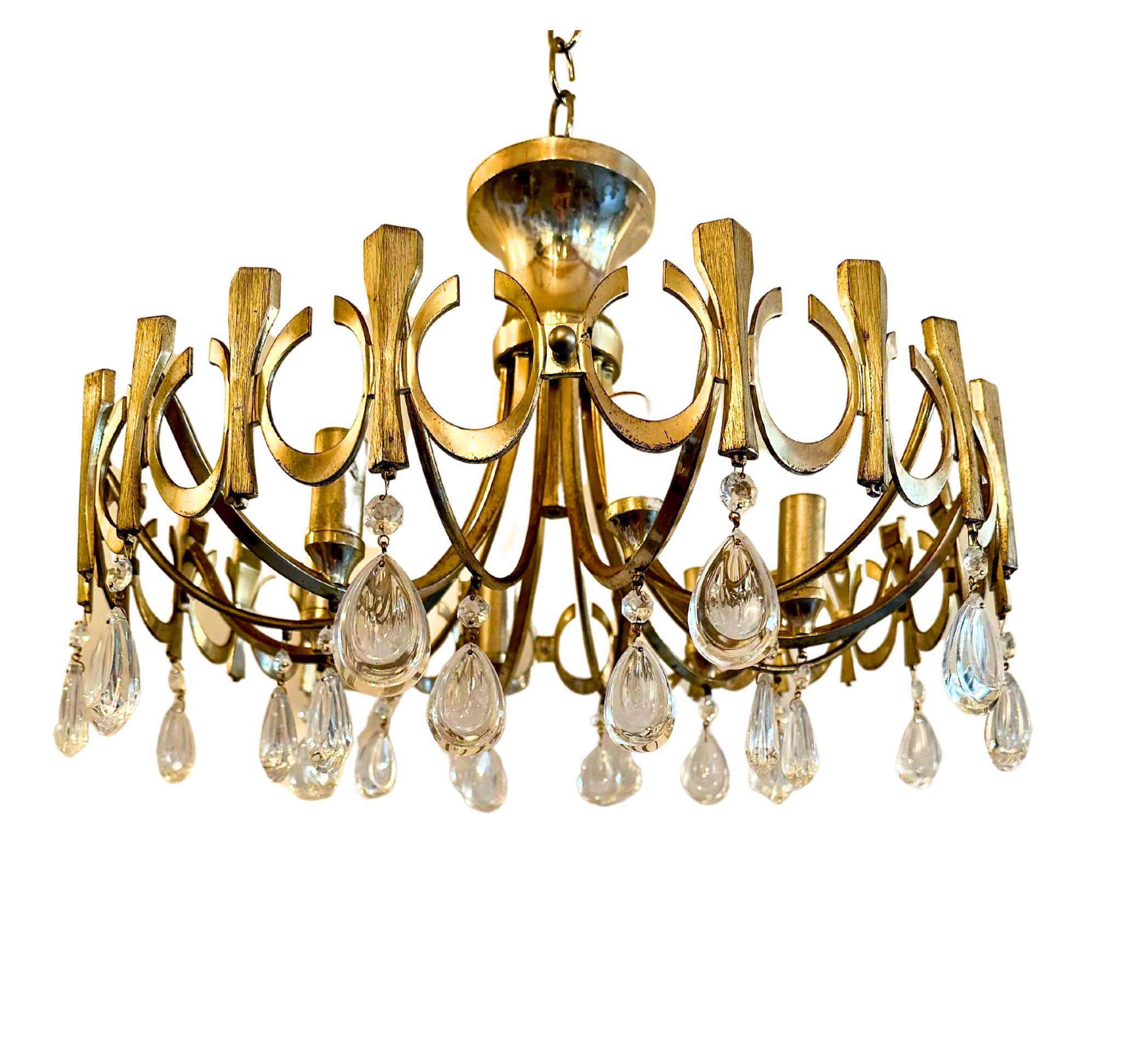 This fixture gives you a modern feel with an old world look! 
It has a silver/gold mixture of a finish to add more character 