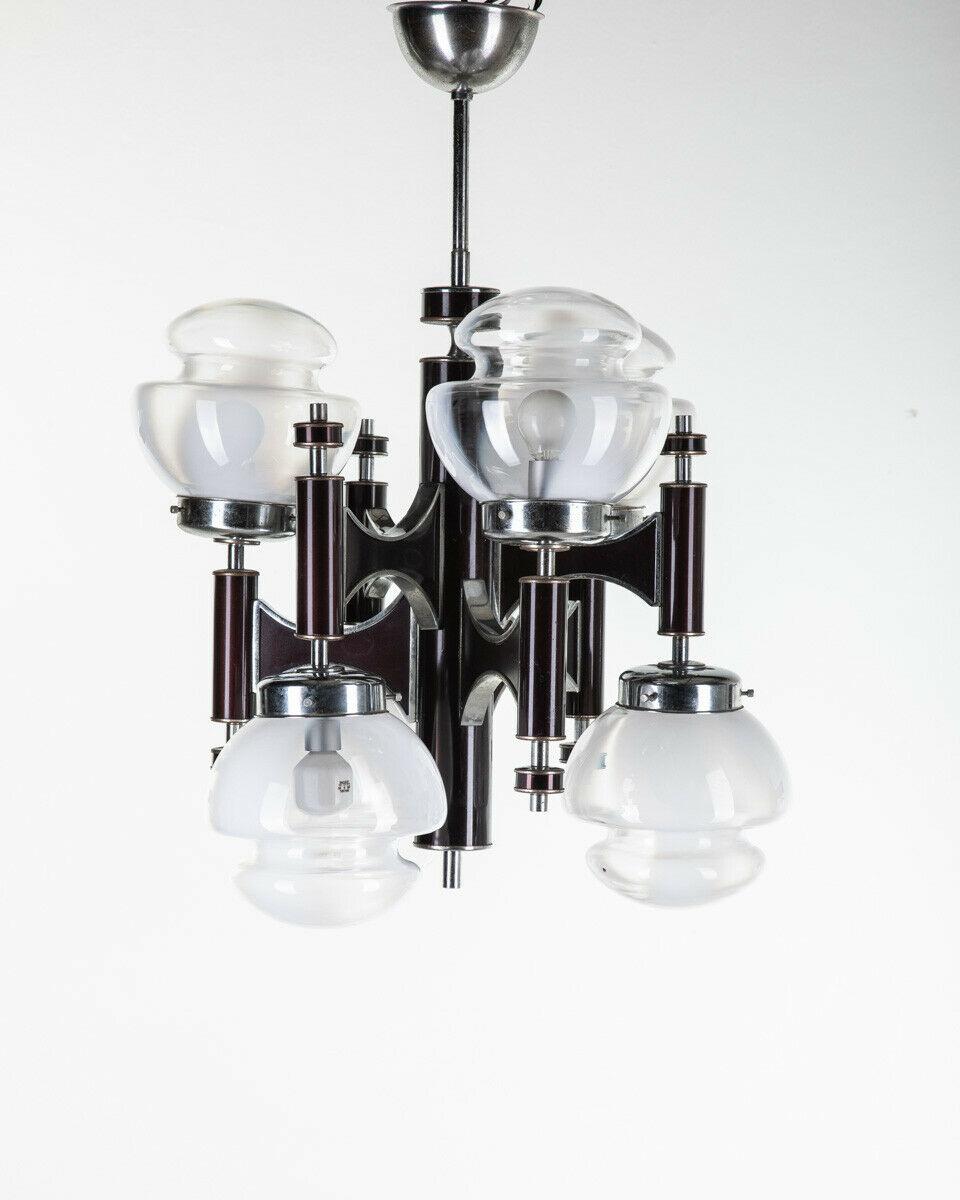 Chandelier in dark brown and chromed metal, with six lights with murano glass lampshades.
Design Gaetano Sciolari for Sciolari, 1960s.

Conditions: In good condition, working, it may show signs of wear due to time.

Dimensions: height 63 cm;