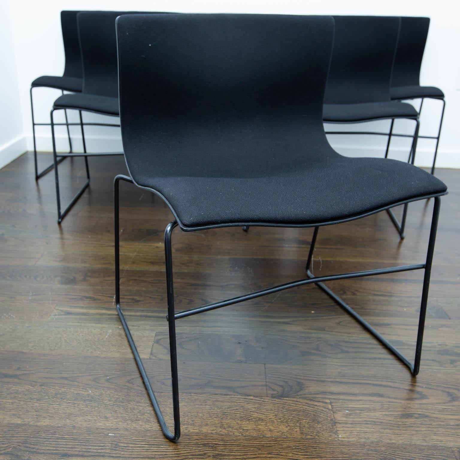 One of the most comfortable chairs I've ever sat in. The ergonomically-designed upholstered steel backs hug your back. These are the relatively rare upholstered versions of a design by Massimo Vignelli for Knoll Studios in 1985. We have several sets