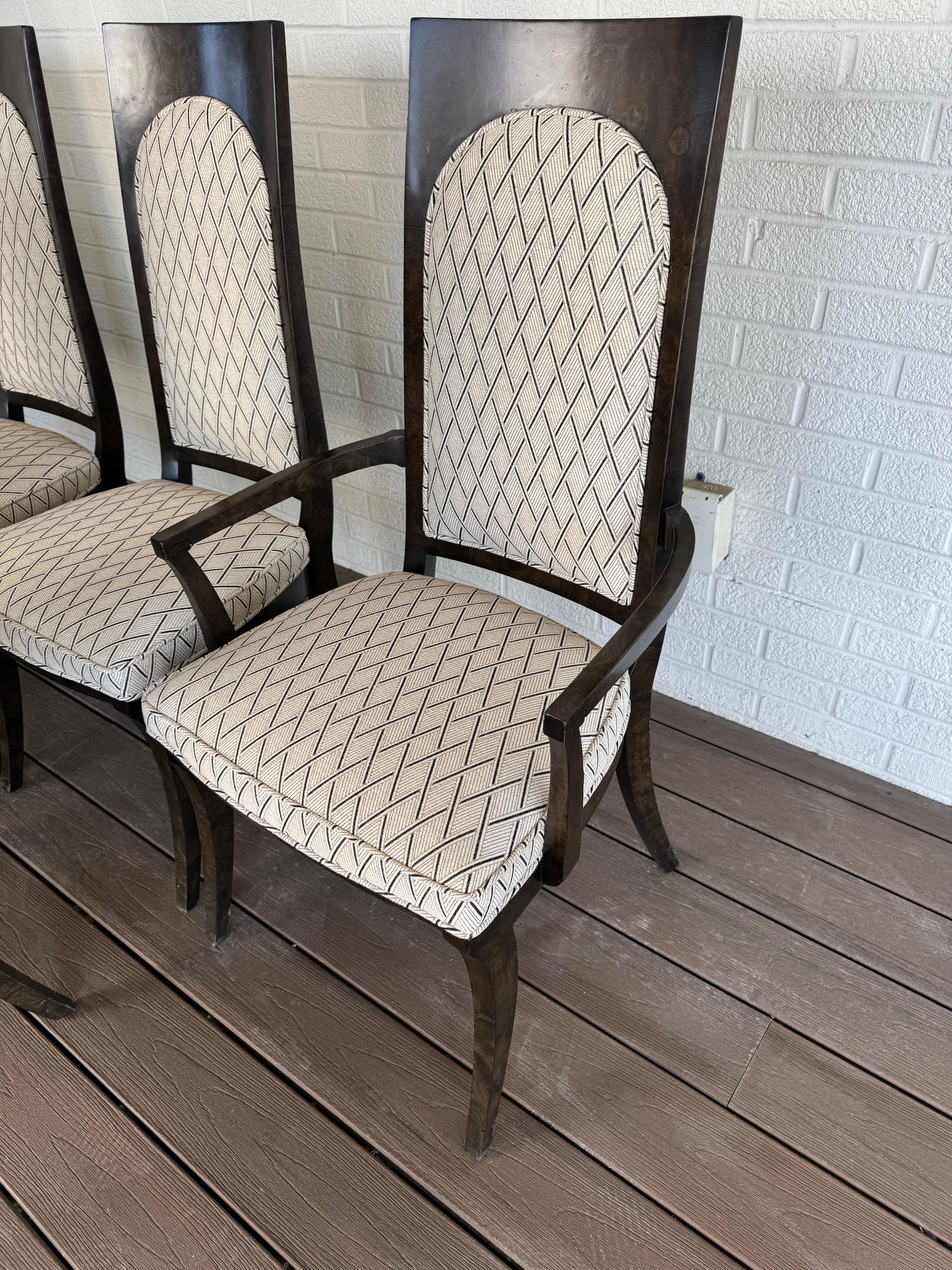 Spectacular set of Mastercraft Burled Amboyna Dining Chairs consisting of 4 side chairs and two arm chairs. Recent contemporary upholstery shows pristinely. Gorgeous set of these Iconic pieces from Mastercraft. 
