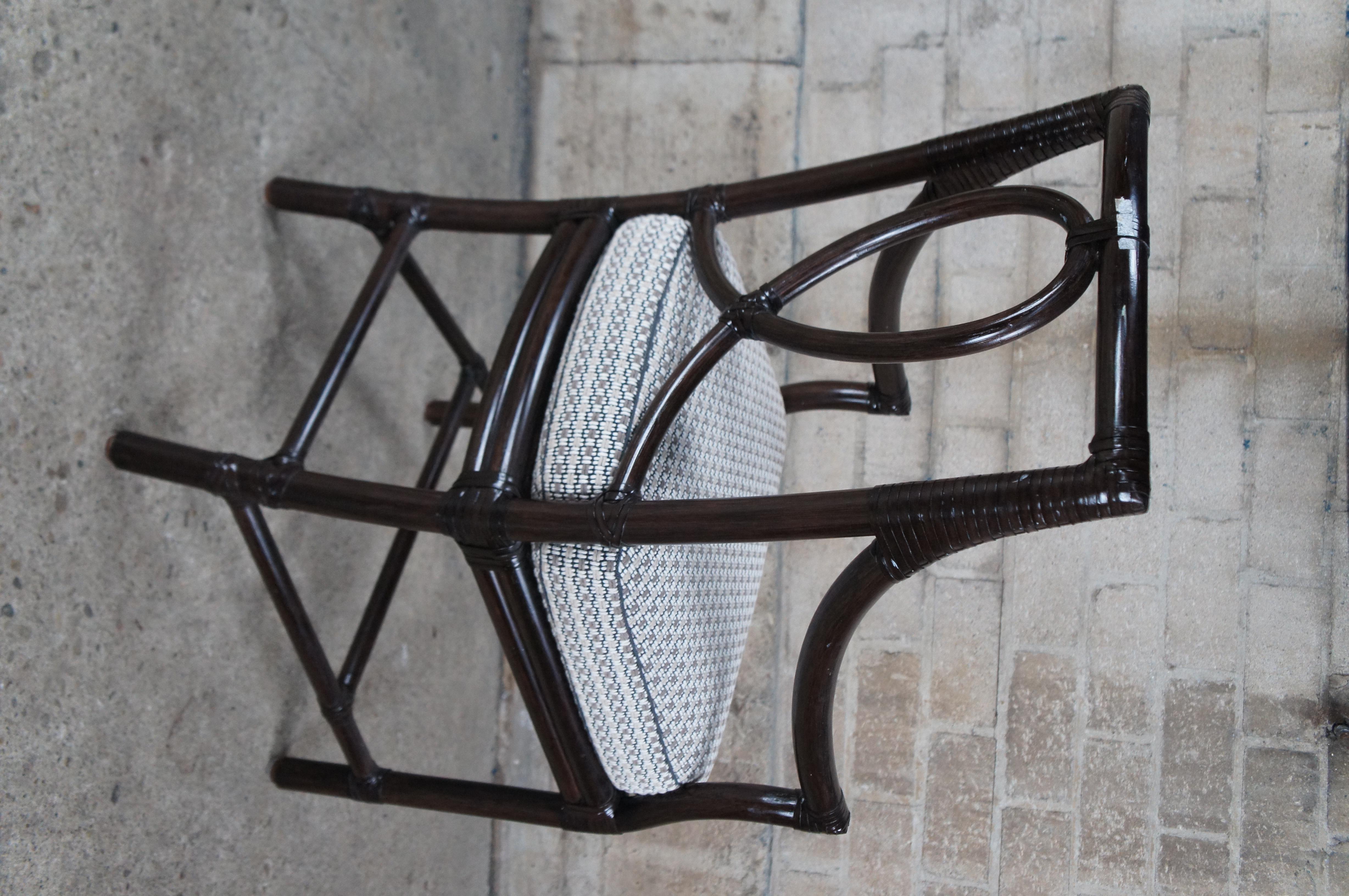 Vintage McGuire organic modern breakfast / dining / card / game arm chairs.  Made of tubular bamboo and rattan construction featuring a sinuous looped back splat and sloped arms with dark finish.

McGuire Furniture Company
Like so many artists and