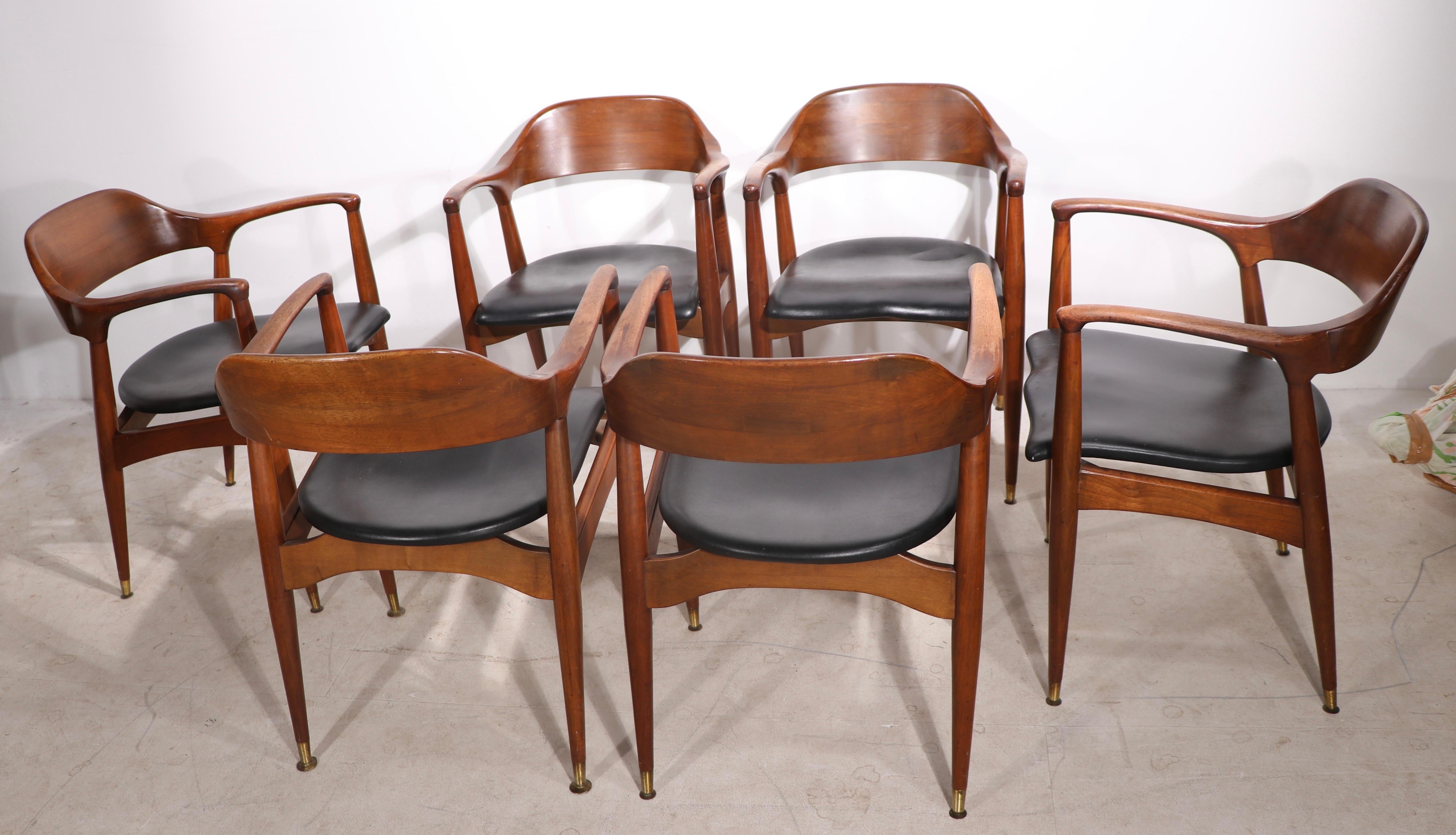 Rare opportunity to purchase a complete original set of six dining, arm chairs by Jack Van Der Molen for the Jamestown Lounge Company. The chairs exhibit sculptural sophistication, while still feeling down to earth not pretentious. 
 All are in very