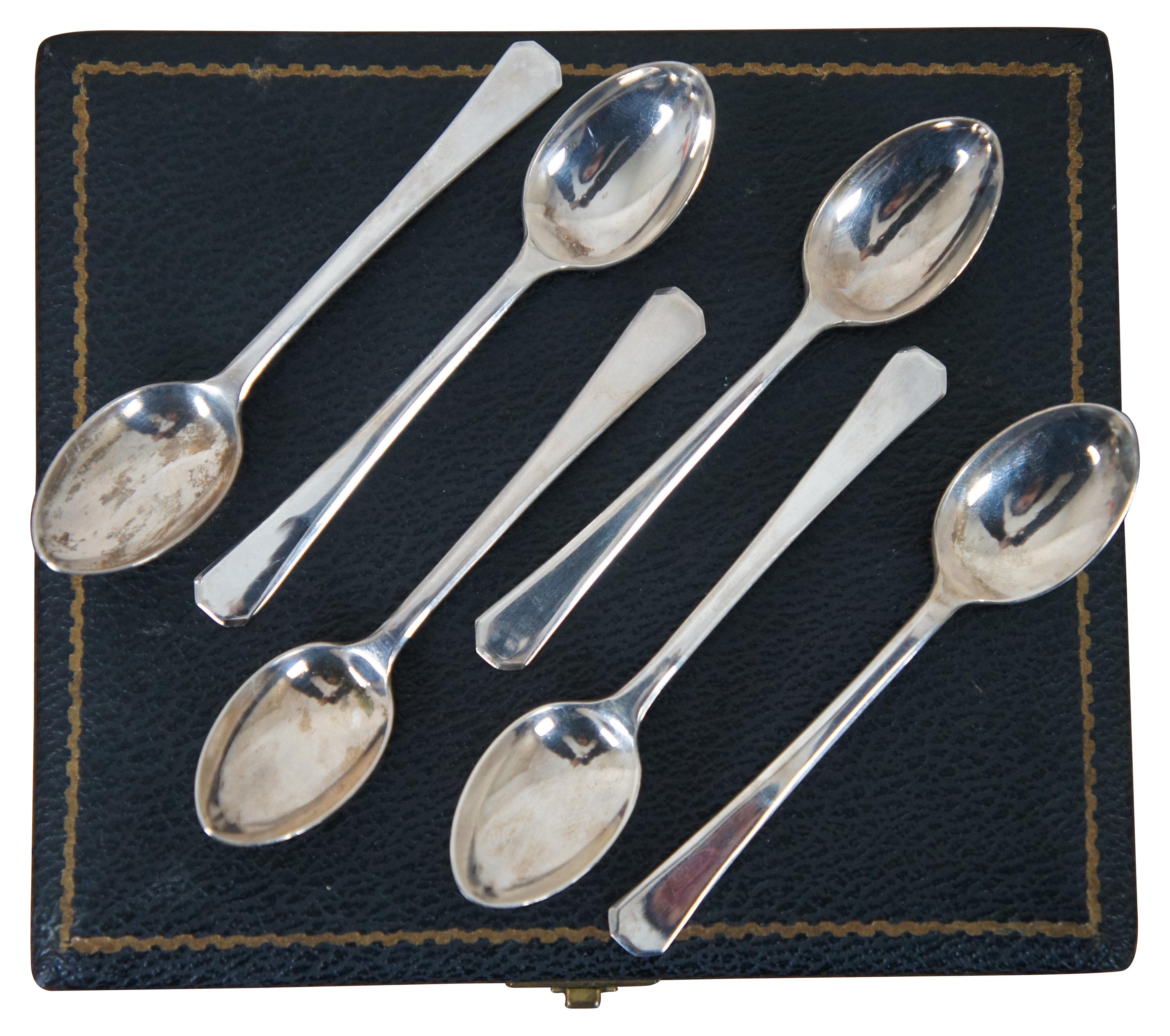 Vintage 1957-958 boxed set of six sterling silver coffee / demitasse spoons. Made in England and marked with Gothic letters HH in rectangular cartouche.

HH gothic into a rectangle is attributed to H Hayes of Birmingham England.

Measures: 3.75”