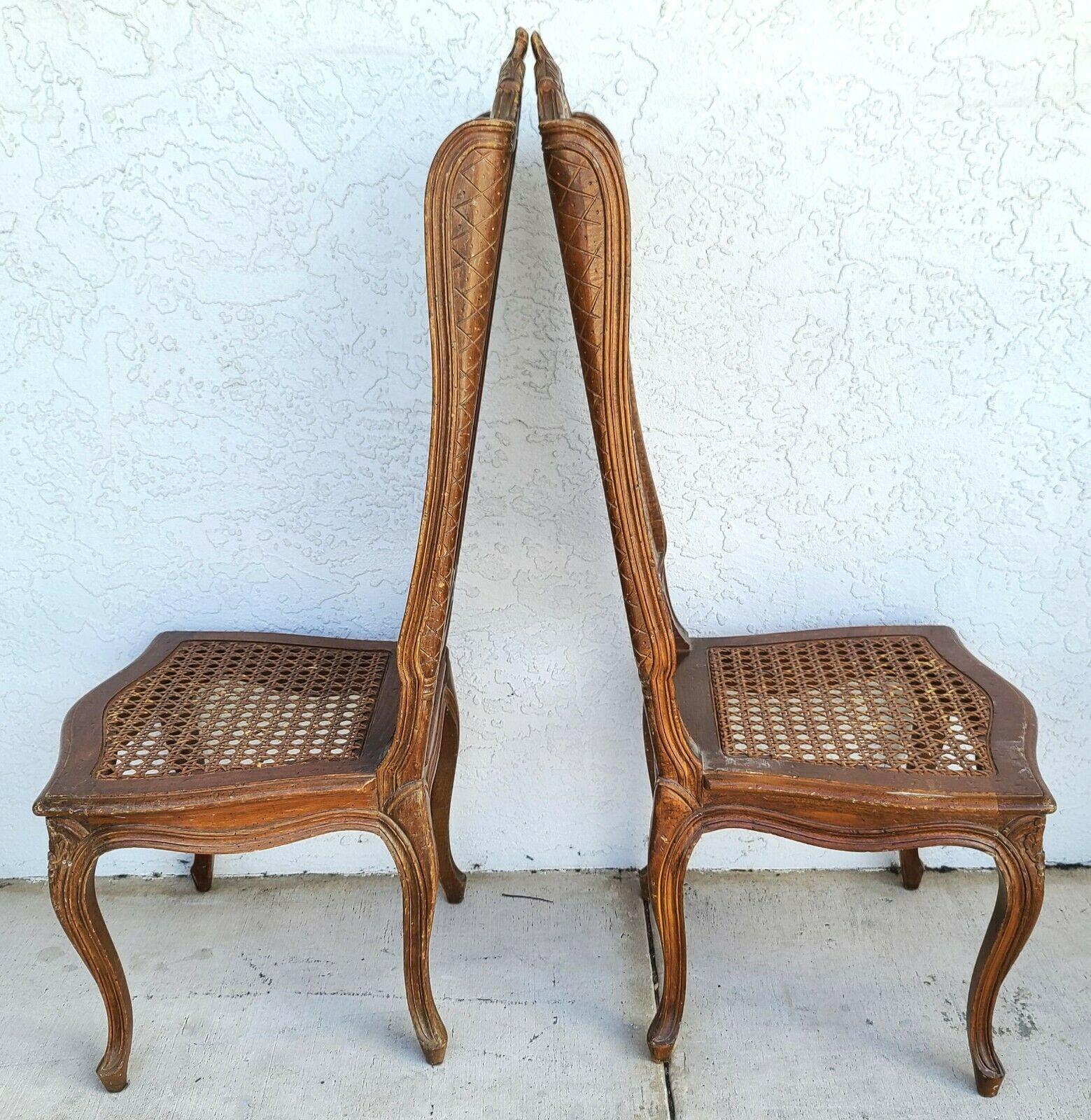 Offering One of our recent palm beach estate fine furniture acquisitions of a set of (6) mid century French wingback cane dining chairs by Mariano Garcia of Spain

Approximate Measurements in Inches
47