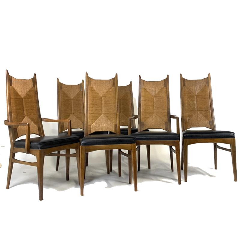A sculptural set of six Mid-Century Modern rush backed dining chairs in walnut with Naugahyde upholstery in the manner of Mel Smilow or Bert England . The set consists of two arm chairs and four side chairs in very nice original condition.
Side