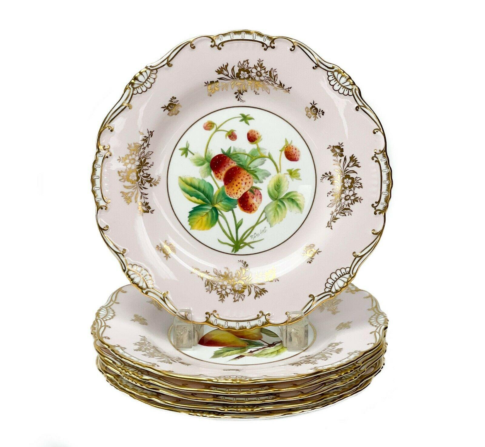 6 Minton Hand Painted Porcelain Dessert Plates Fruit Signed c. 1950 Tiffany

6 Minton England hand painted porcelain dessert plates, circa 1950. A pink ground with various hand painted images of fruit to the center. Gilt floral decoration to the