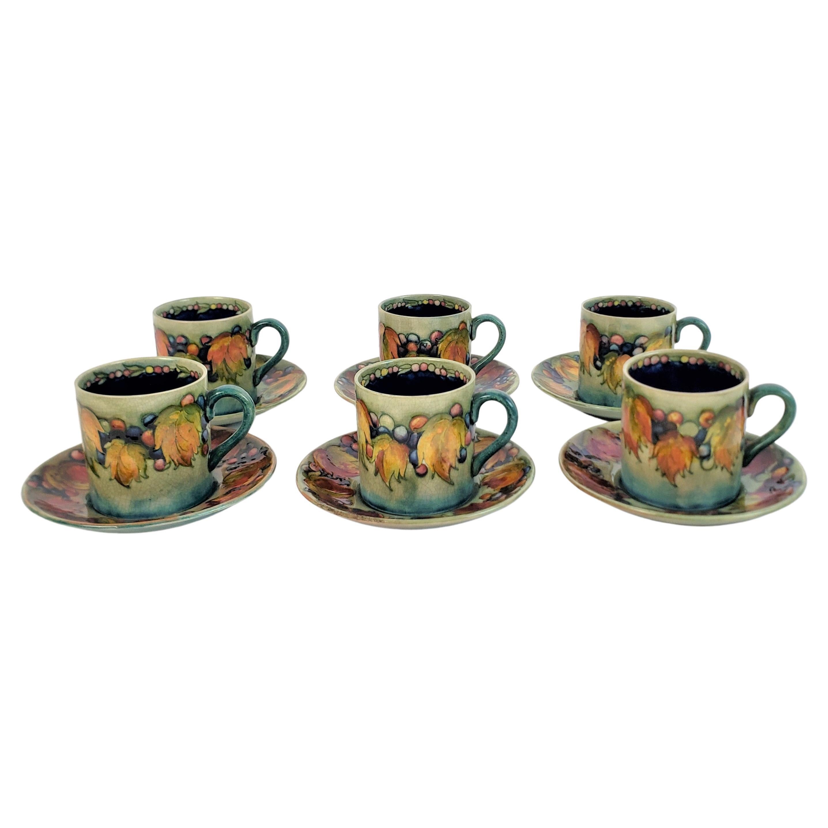 6 Moorcroft Art Pottery Demitasse Cup & Saucer Sets in the Leaf & Berry Pattern For Sale