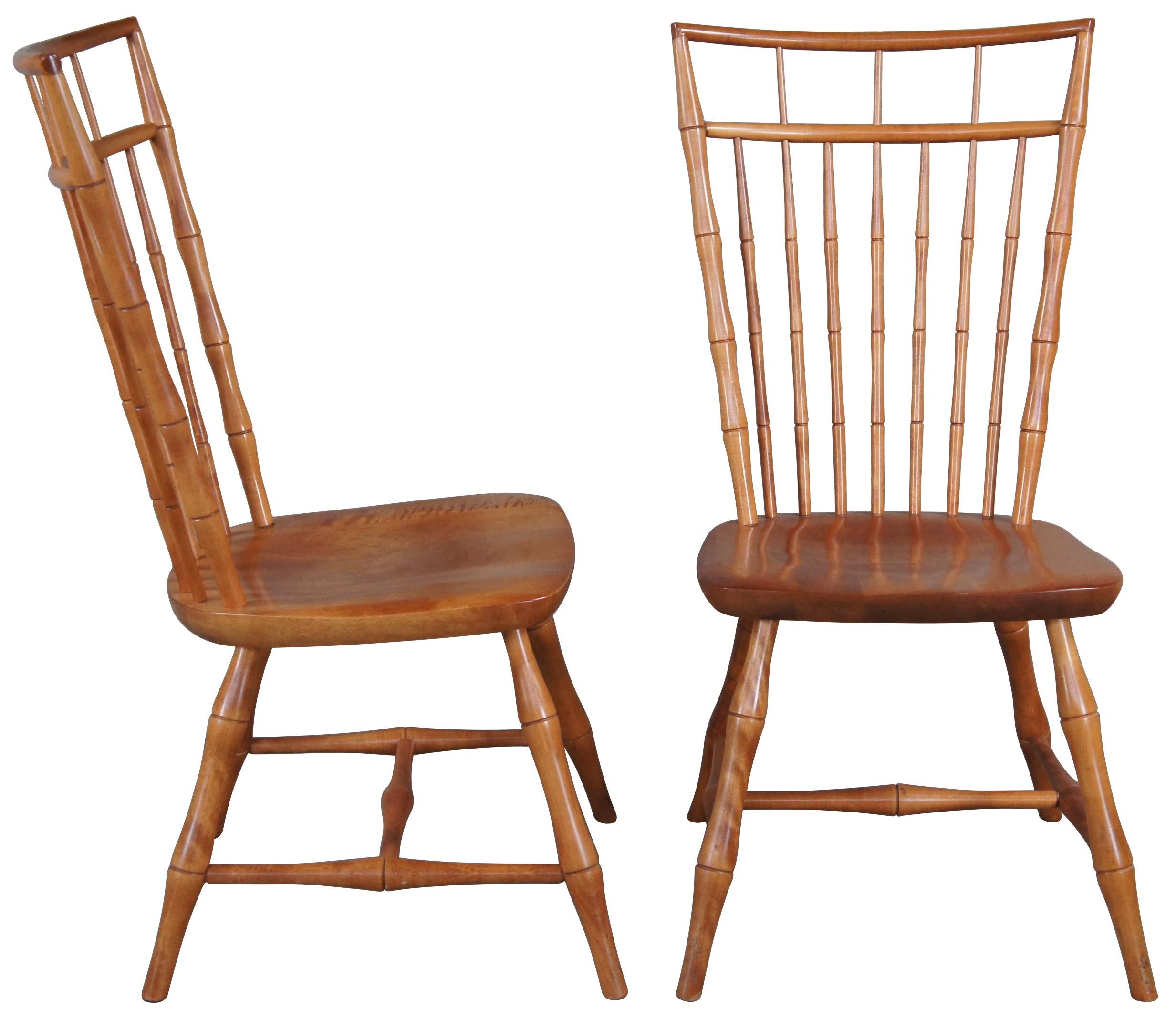 Six gorgeous birdcage Windsor style dining chairs manufactured by the Nichols & Stone Company. The chairs are expertly crafted of light maple with split wedge mortise and tenon joinery in the seats & top of the crest rails. Features bamboo shaped