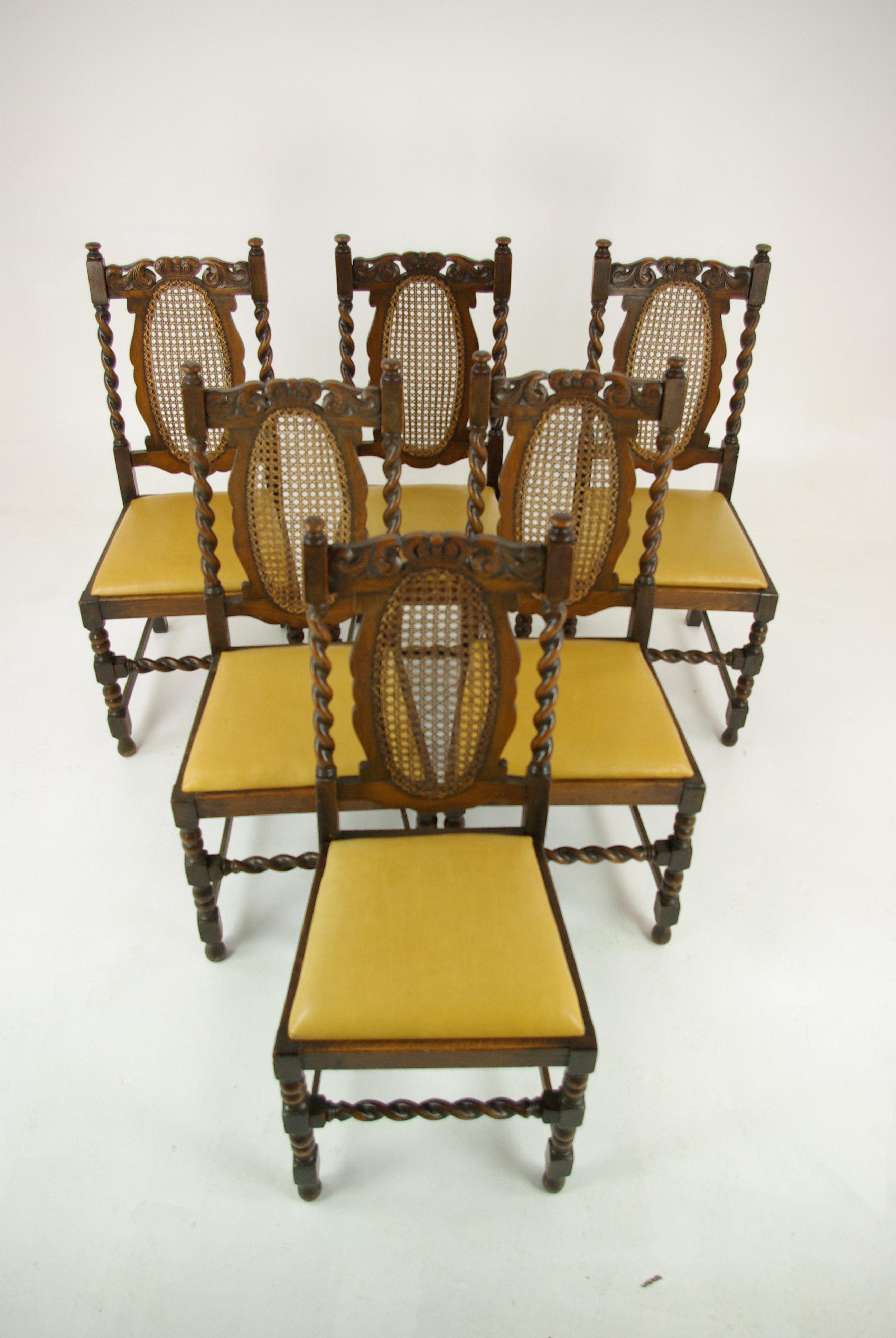 6 oak dining chairs, barley twist chairs, Scotland 1920, antique furniture, B1375

Scotland 1920
Solid oak
Original finish
Carved and shaped back rail
Original oval bergre cane panels in excellent condition
Barley twist supports with turned