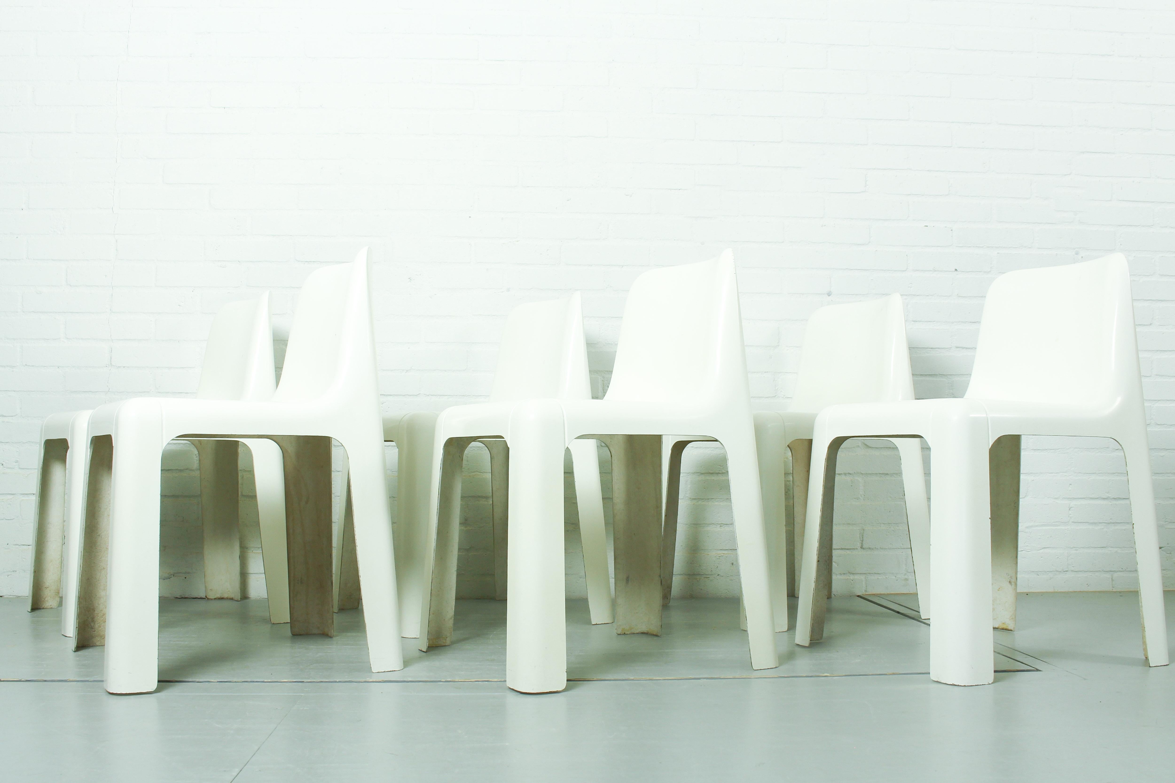 Set of 6 fiberglass chairs model OZOO 700 designed by Marc Berthier for Roche Bobois, France 1970s.  The chairs are suitable for indoor and outdoor use. The chairs are in original condition with some traces of use in accordance with age (see