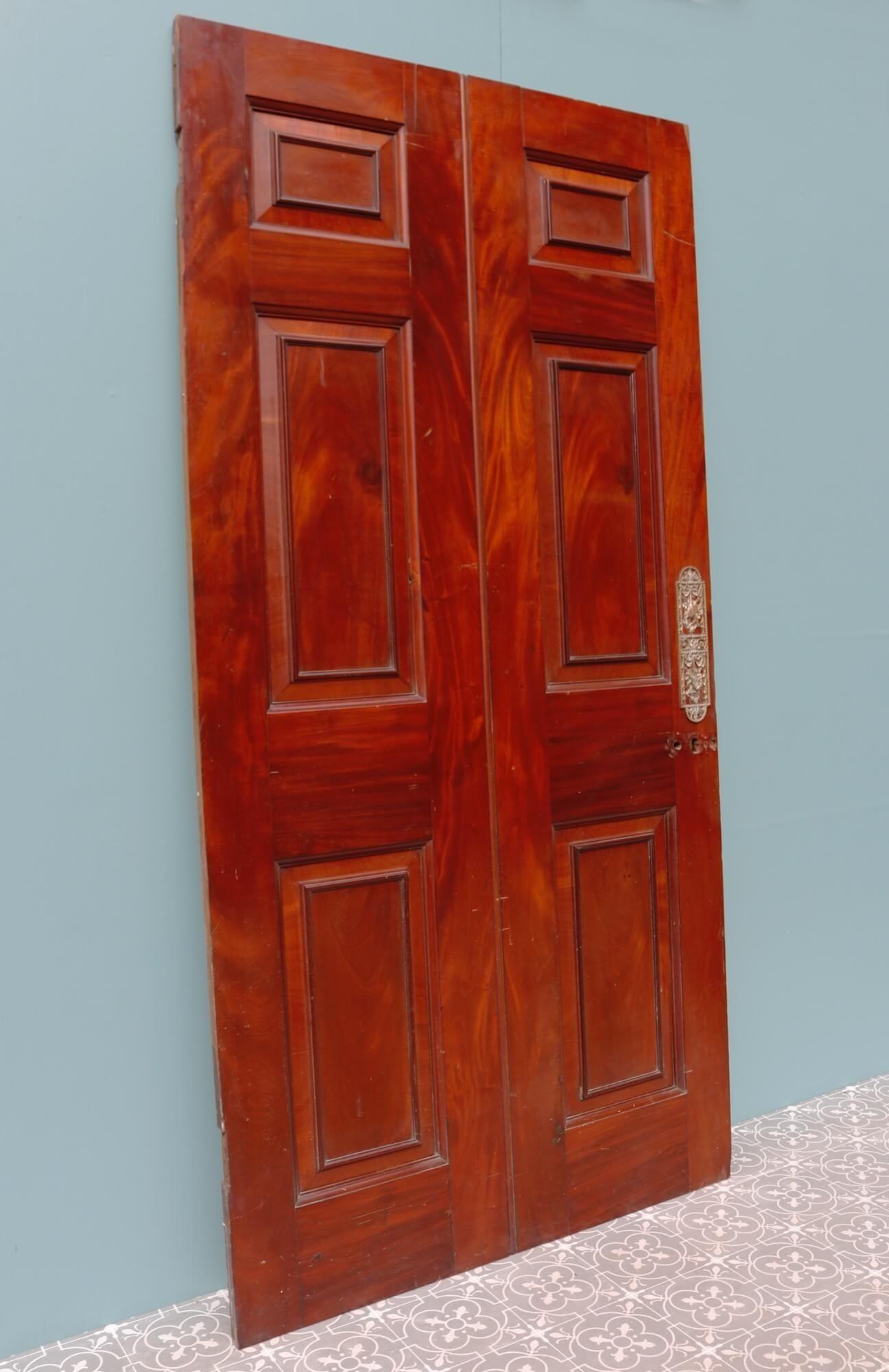 This handsome Georgian internal door dates as far back as the late 1700s. Made from mahogany, it has a rich colour and stunning flame Mahogany wood grain, making for a beautiful interior door in a period property. To the front is mahogany, detailed