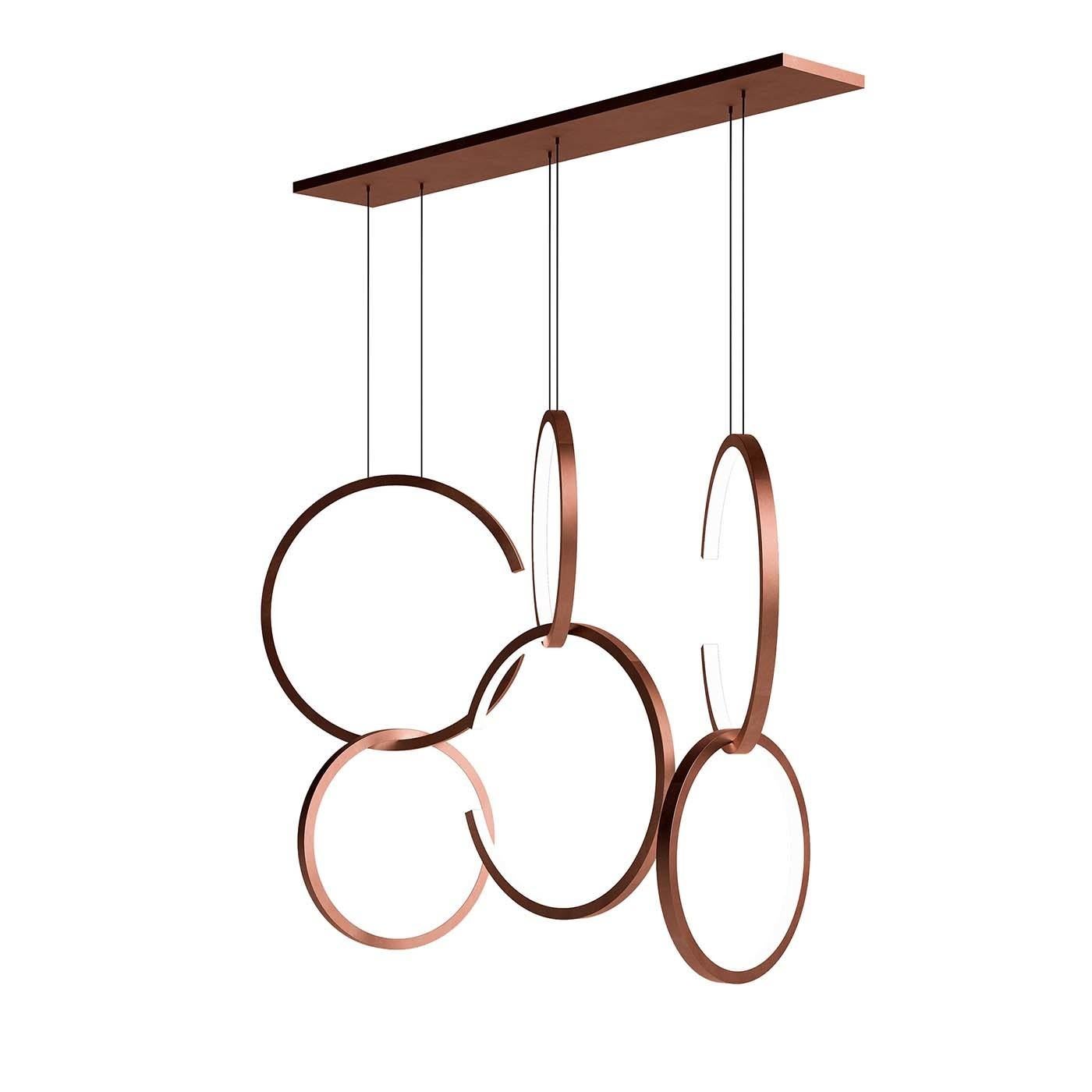 Boasting impressive formal presence, this refined chandelier is the perfect centerpiece in an entryway, dining room, and loft space in a contemporary-styled interior. This elegant piece is crafted entirely of metal with a brushed-copper finish and