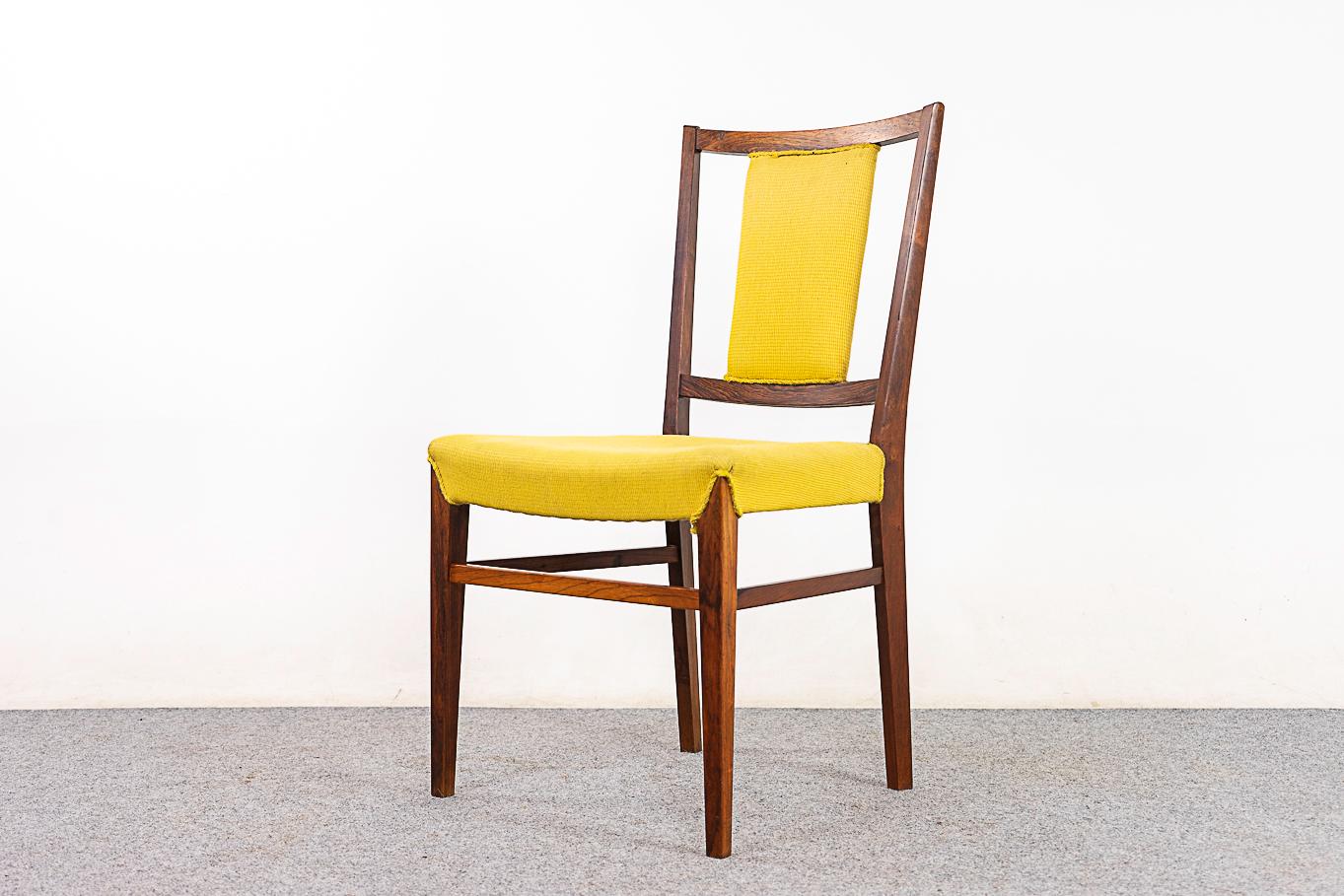 Rosewood Danish dining chairs, circa 1960's. Lovely wood grain, beautifully curved backrests and generous seat. Original upholstery with wear & tear, a lovely set for you to customize on your end!
