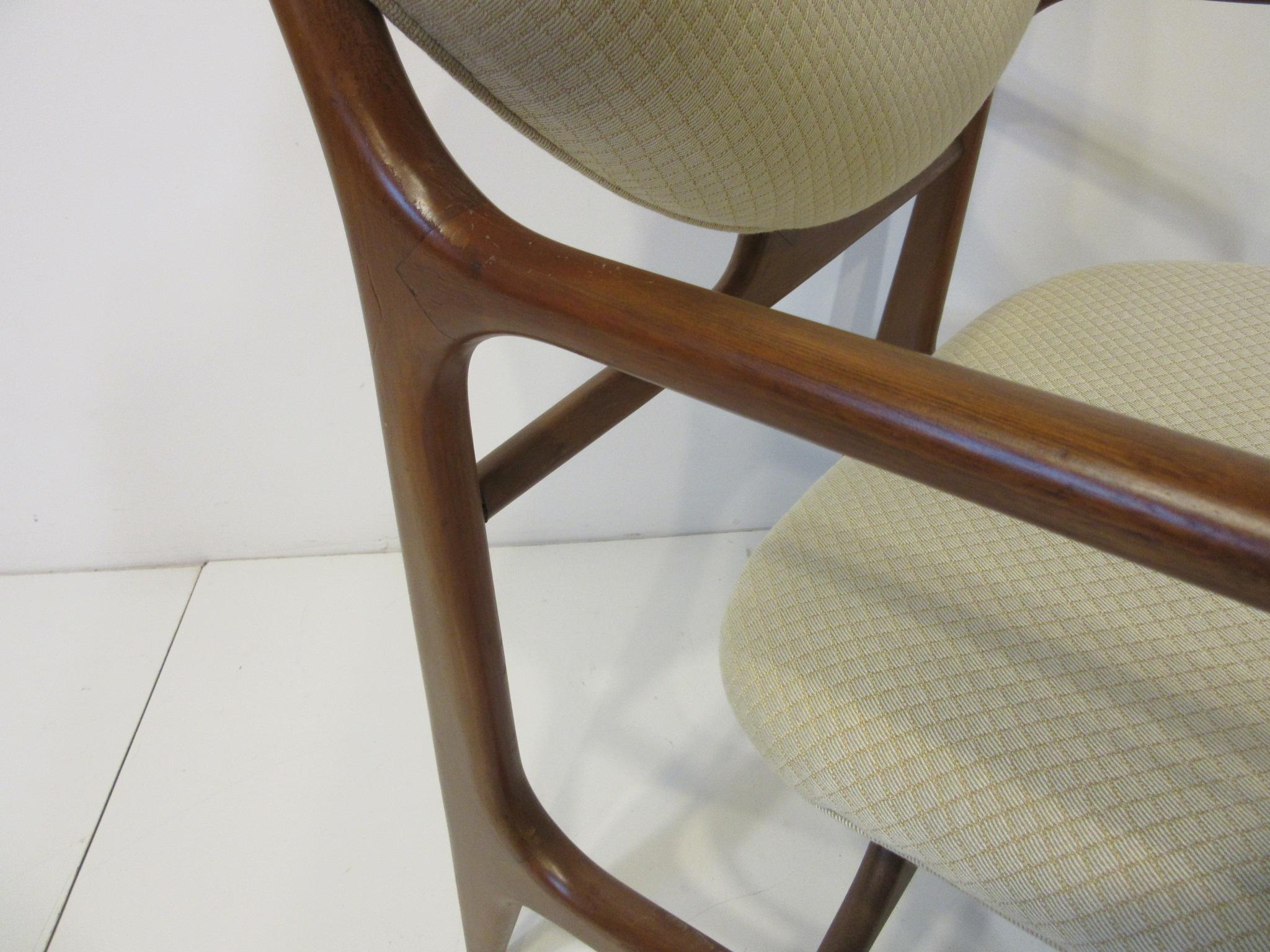 20th Century 6 Sculptural Wood and Upholstered Dining Chairs in the style of Finn Juhl