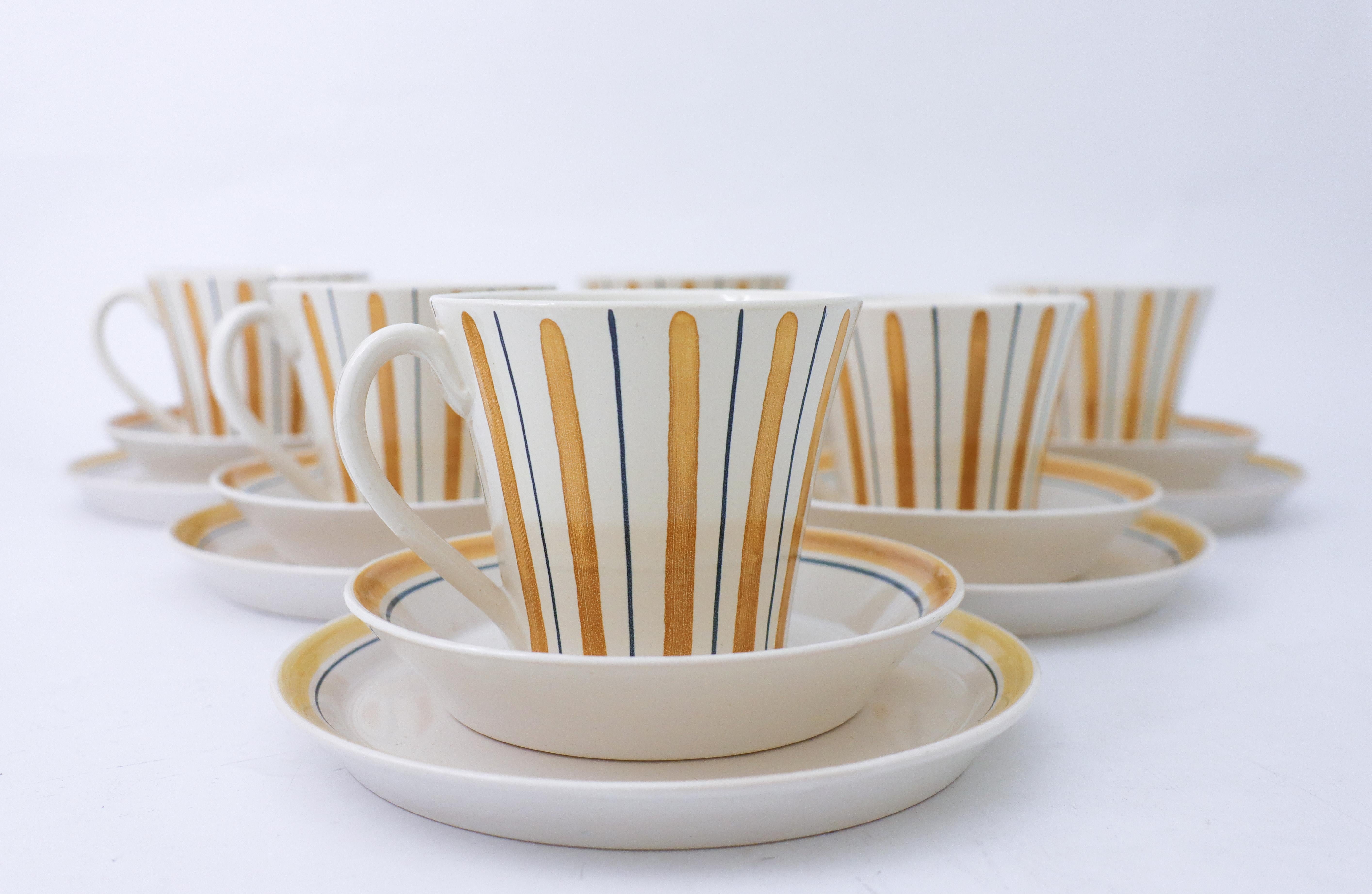 6 sets of teacup, saucer and a cake plate designed at Bo Fajans in Gefle, Sweden and of the model 