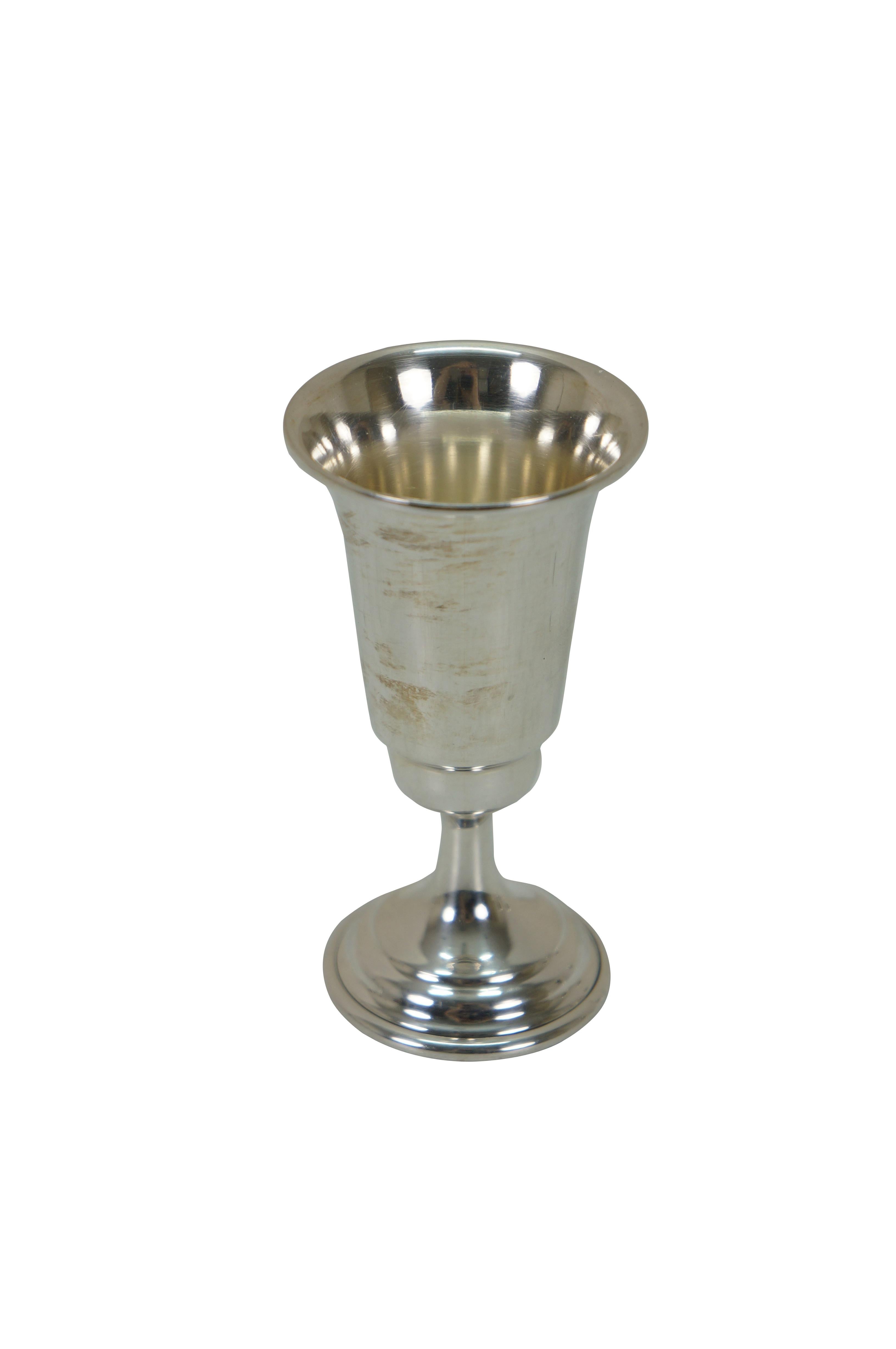 Set of 6 sterling silver miniature goblet shaped liquor / port / cordial / aperitif glasses. Weight 24.6 g each or approximately 150 g total. Marked Sterling on edge of base.

Dimensions:
1.75
