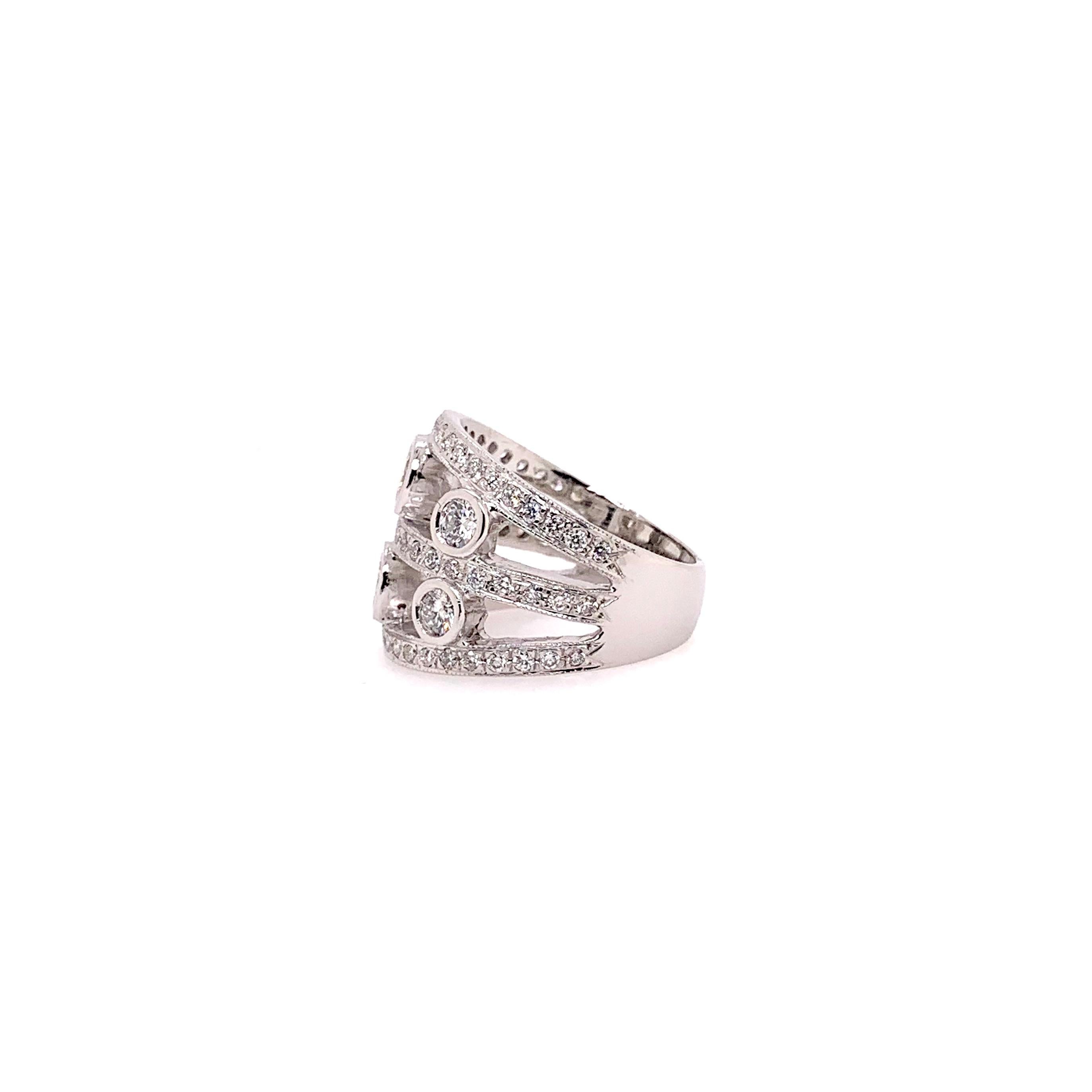 Cette bague à chaton en diamant à 6 pierres est une véritable merveille !  Fabriqués à la main en or blanc 14 carats, les diamants ronds et brillants ont un poids total de 1,53 ct.  Cette bague polyvalente peut être portée de manière décontractée ou