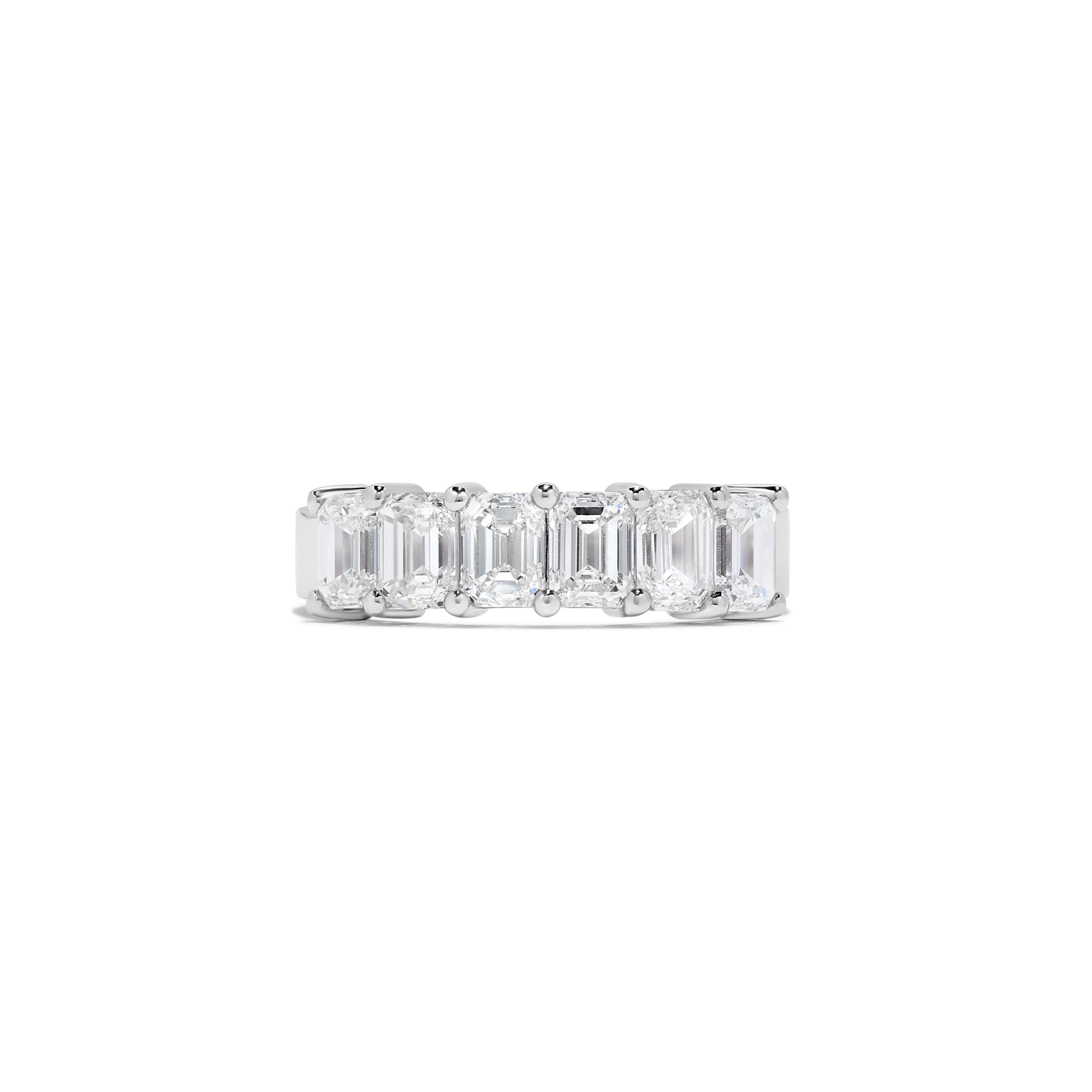 This Emerald Cut Diamond Ring features 6 graduated GIA Certified H-J VS-VVS Diamonds weighing 0.39 -0.41 carats each for a total of 2.35 carats all set in Platinum. 

