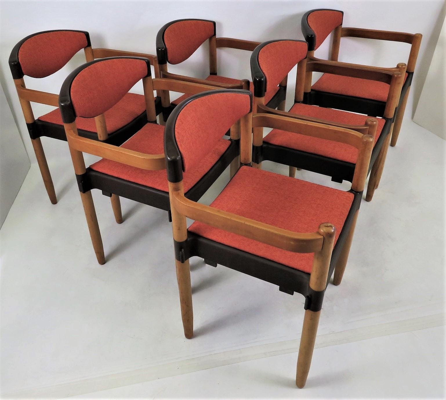 Designed by Harmut Lohmeyer in the 1970s and made by Casala in the late 70s. Called Strax, they are stackable. The seat and back cushions have been re-upholstered, the Beechwood has the original finish with age appropriate wear and finish fading and