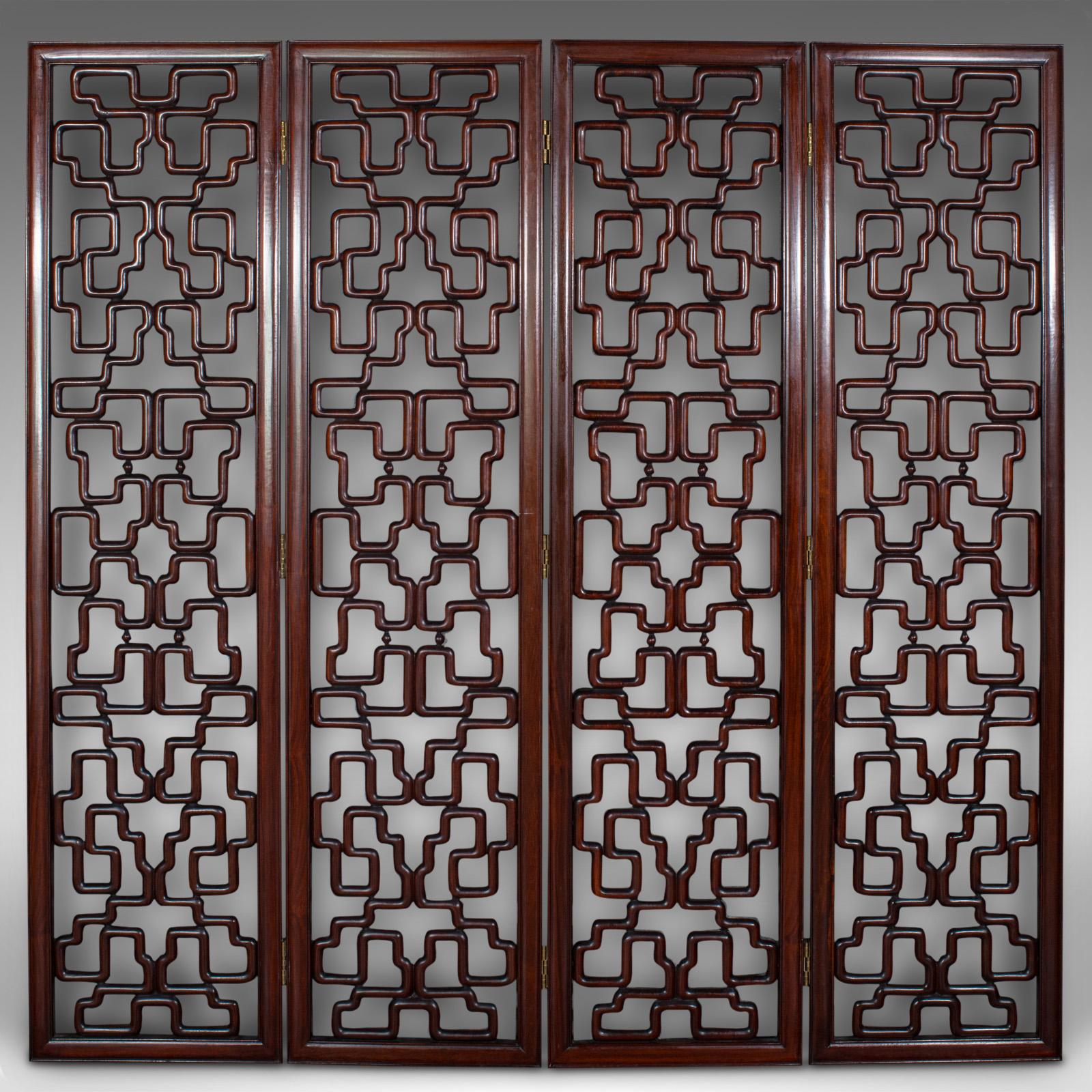 
This is a tall vintage room divider. A Japanese, 4 fold screen, dating to the mid 20th century, circa 1950.

Usefully articulated screen with superb decorative appeal
Displays a desirable aged patina and in good order
Select stocks present deep