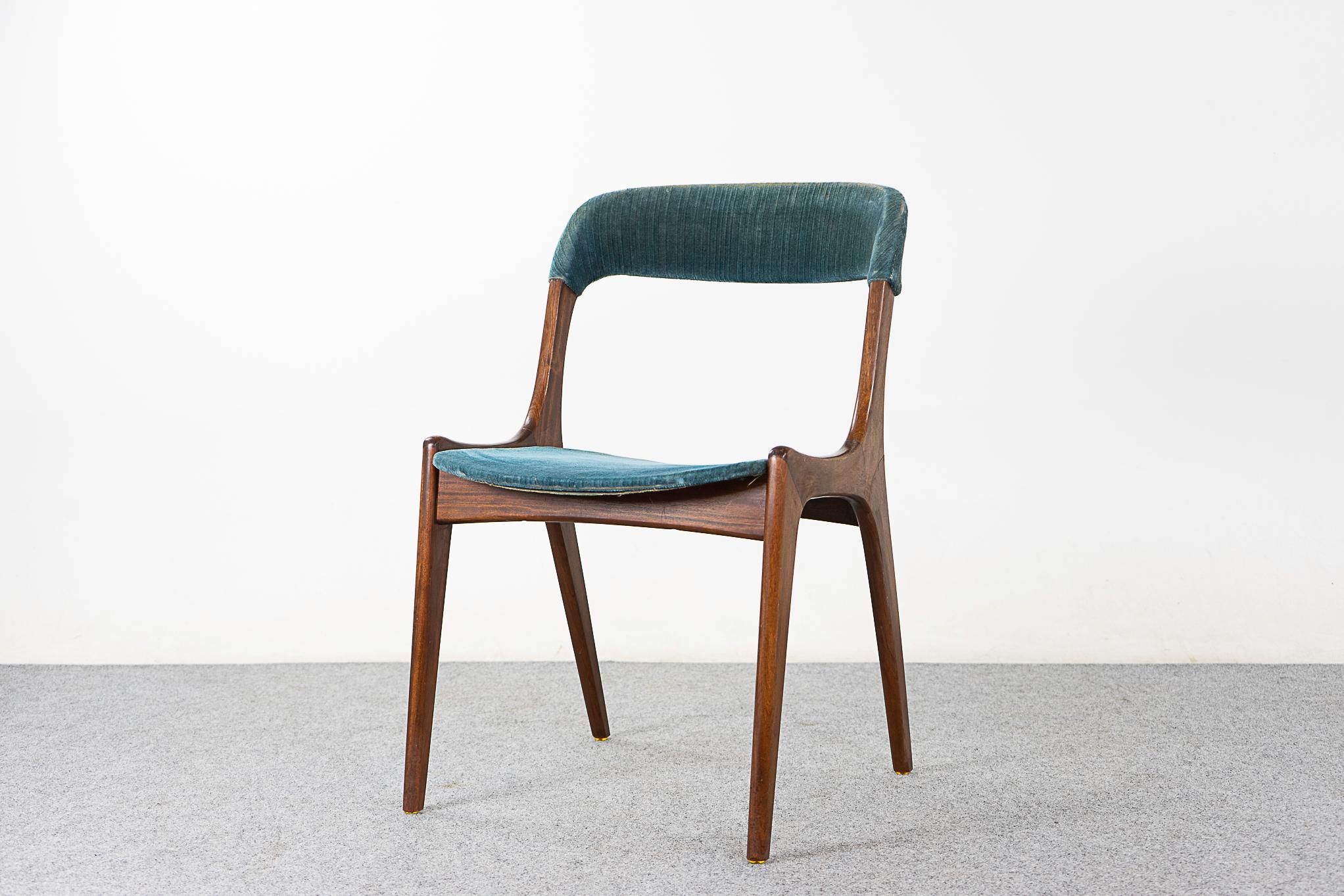Teak mid-century dining chairs, circa 1960's. Gorgeous sculptural lines, curved backrest and generous seat. Perfect patina on this unique frame, original upholstery with wear and tear. 