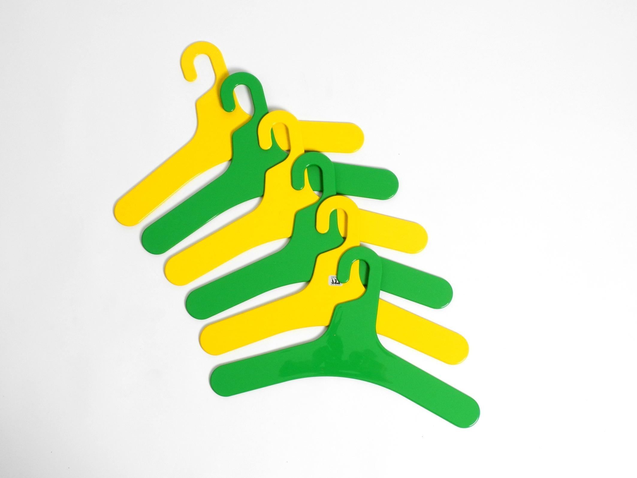 Space Age 6 unused 1970s yellow and green plastic hangers by Ingo Maurer for Design M