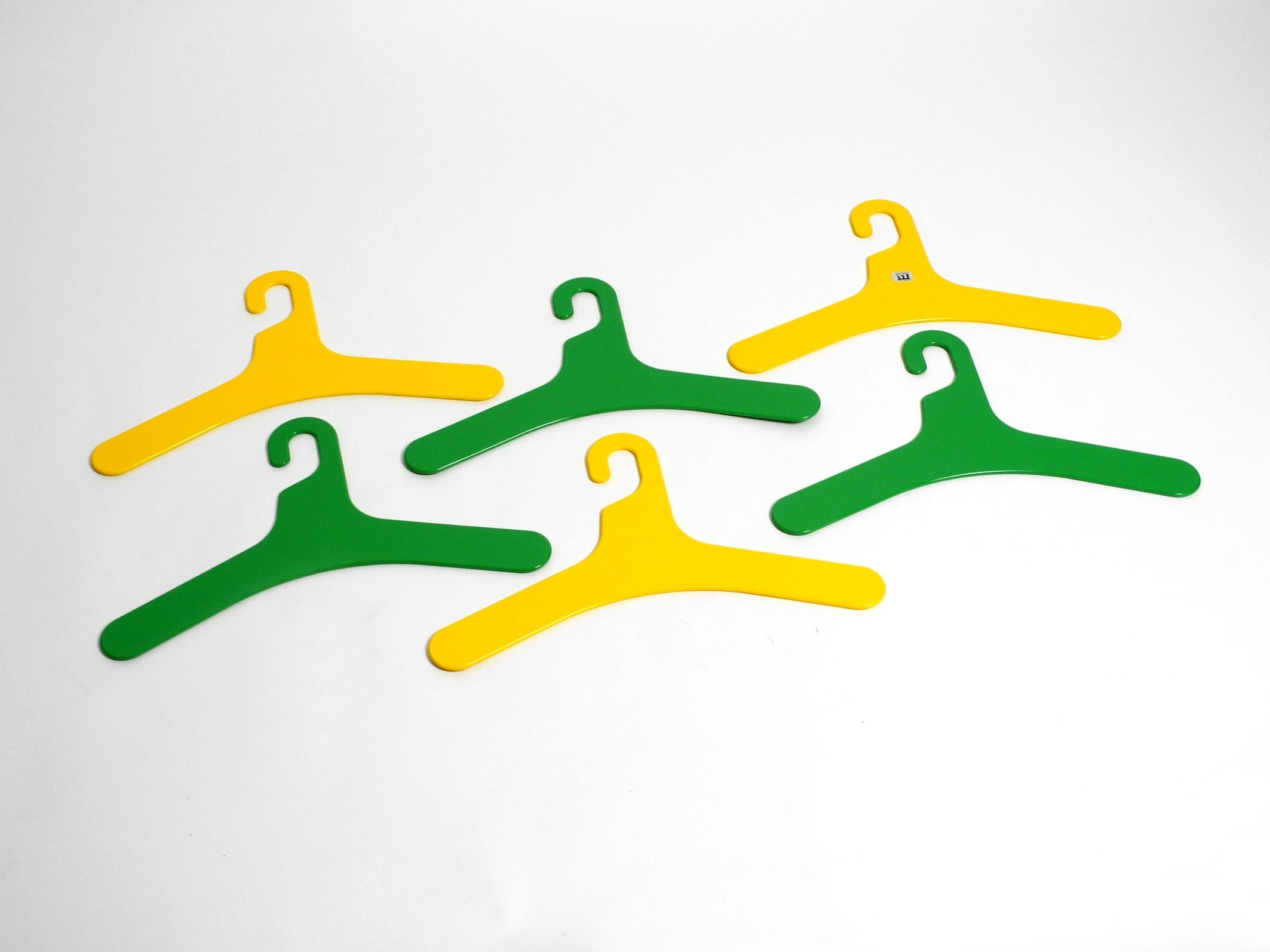 German 6 unused 1970s yellow and green plastic hangers by Ingo Maurer for Design M