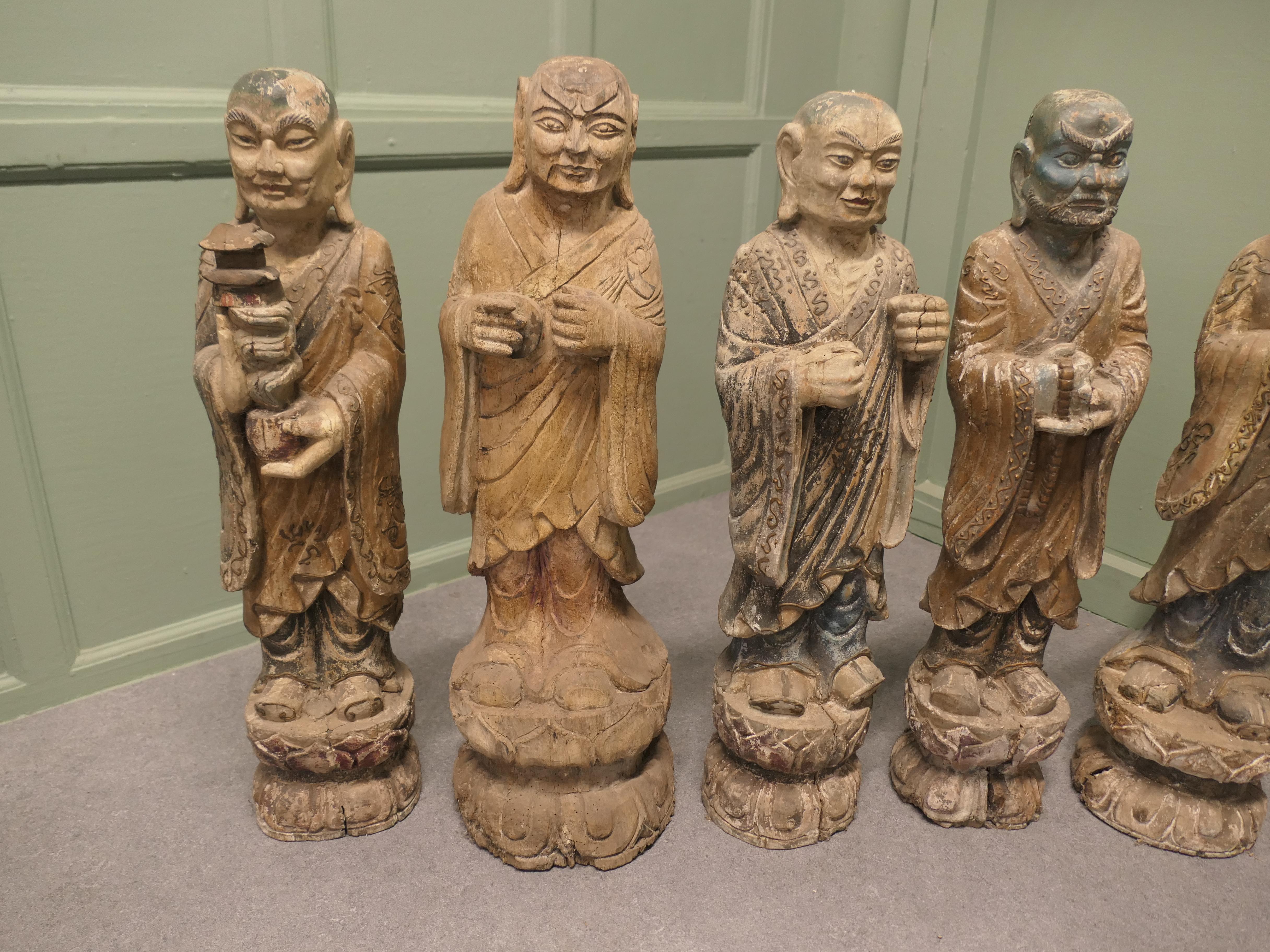 Primitive 6 Very Old Carved Figures of Buddhist Immortals For Sale
