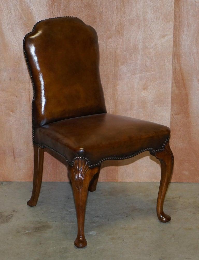 We are delighted to offer this very rare suite of six original fully restored Victoria walnut framed cabriolet legged dining chairs with cigar brown leather upholstery and Shepherds crook curved arms.

These are a very rare and important suite of