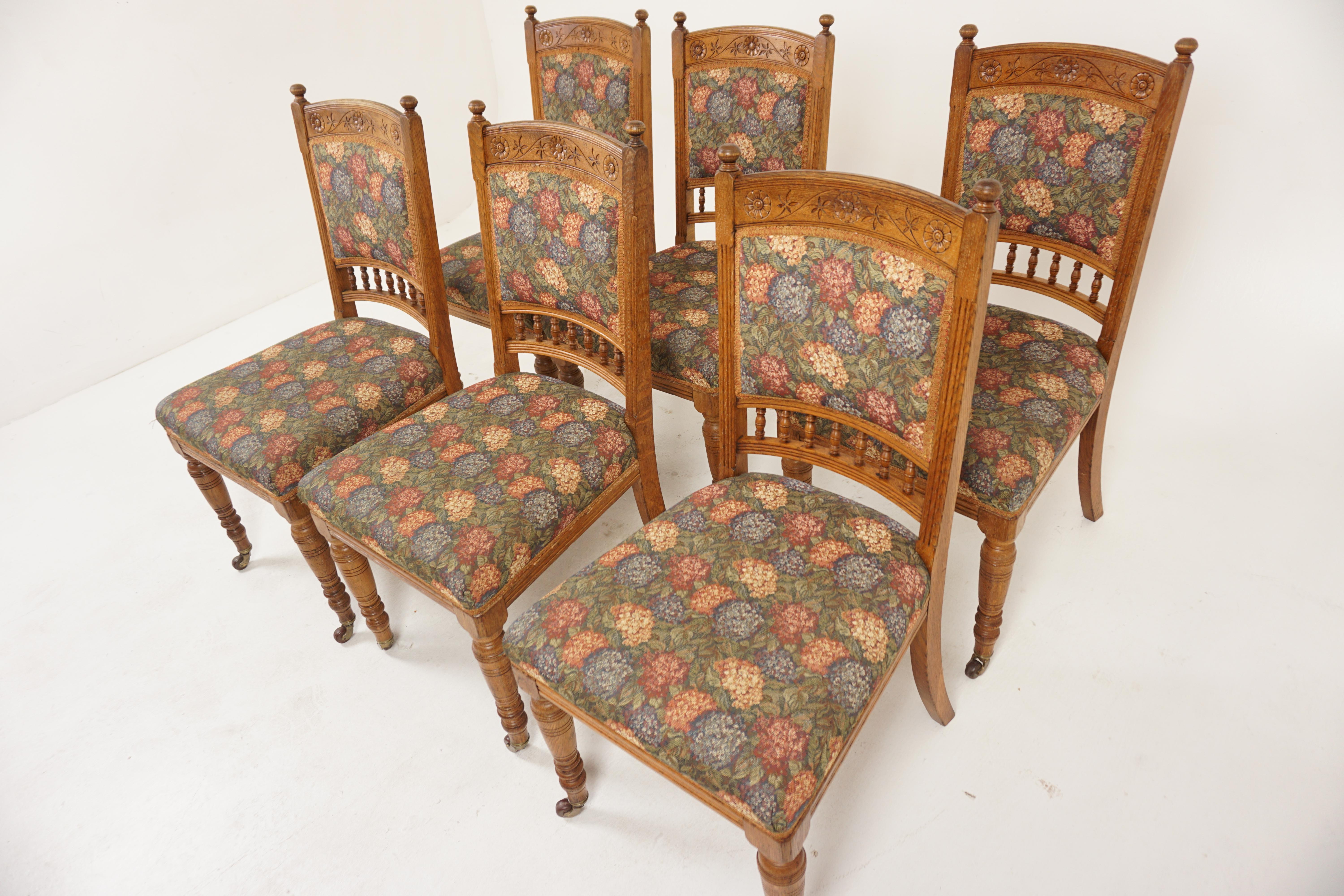 6 Victorian Oak Upholstered Dining Chairs, Scotland 1880, H1169

Solid Oak
Original finish
Carved shaped top rail
Pair of supports on the ends with turned finials on top
Upholstered backs and seats
All standing on turned front legs
Terminating on