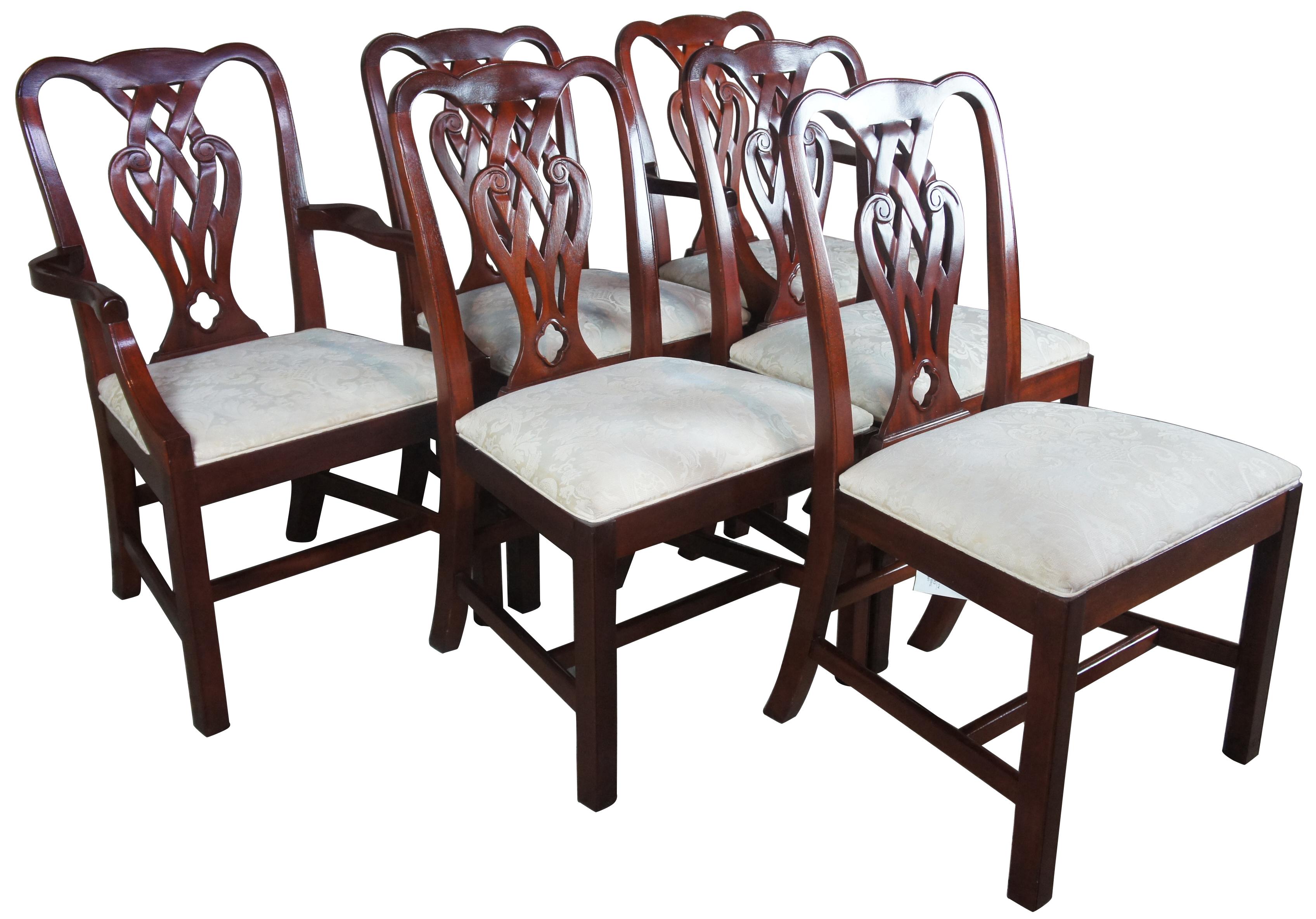 6 vintage baker Chippendale style pretzel back mahogany dining chairs

Baker dining chairs, circa 1980s. Made from mahogany with an interwoven pierced and carved back. Features a brocade upholstered white seat.
