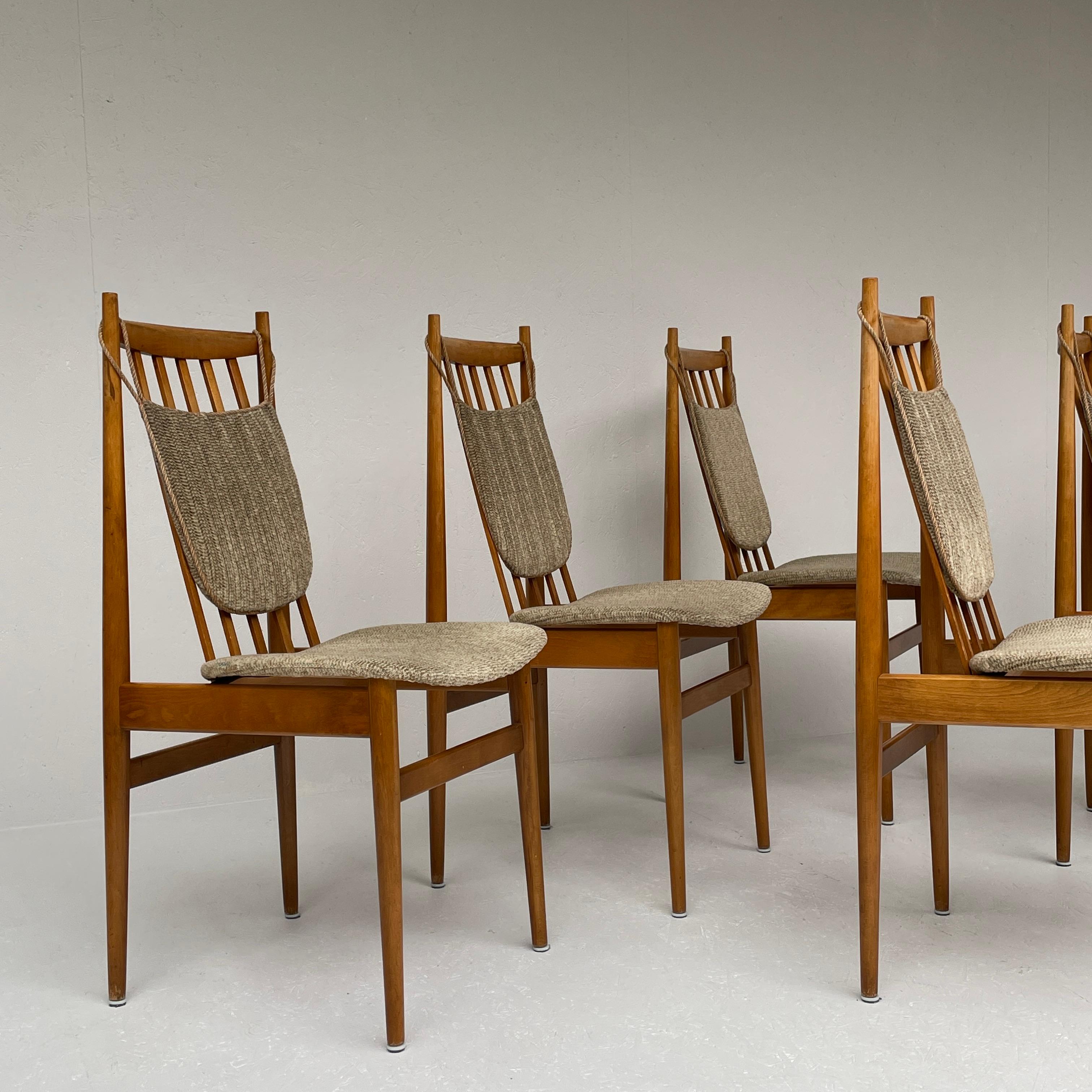 Pair of 6 mid-century side chairs by Casala Modell with angular features throughout wood frame; label underneath; each chair. 

Currently Casala produces modern project furniture with a long life span. Rapid handling times, flexible use and