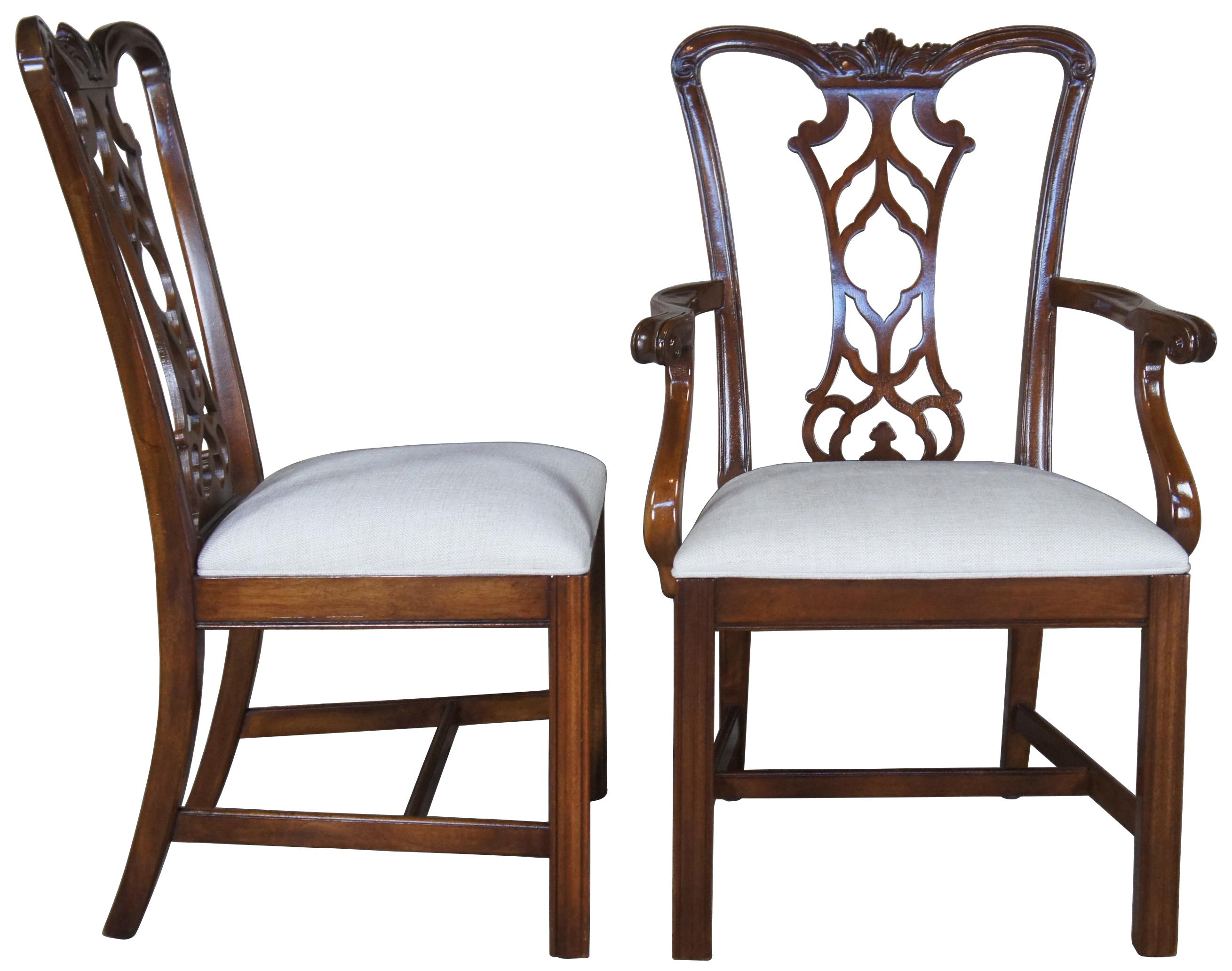 Set of six vintage Drexel Heritage dining chairs. Made of mahogany featuring classic Chippendale styling with carved back, upholstered seat and straight legs. Two arms, four sides. Inspected by Shirly Brackett, plant 5. 141238.
 