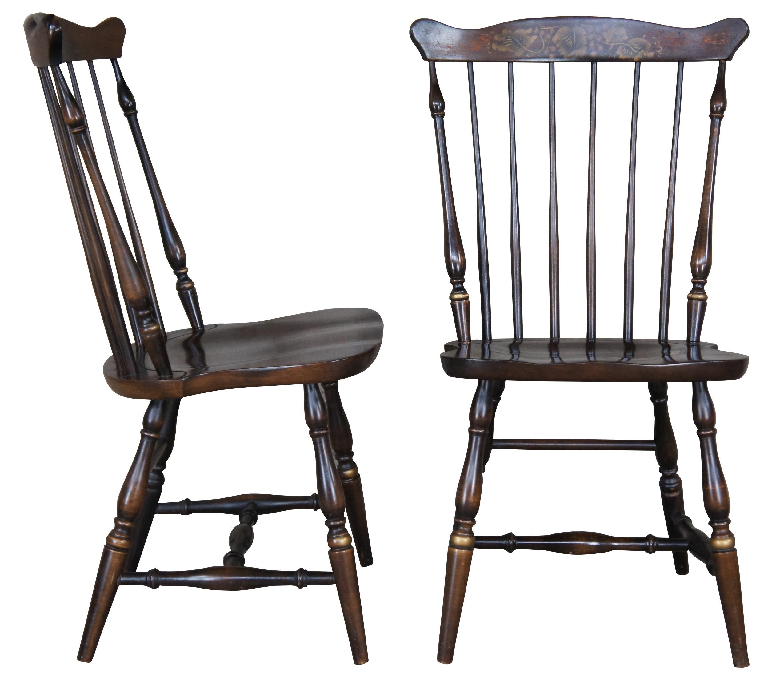 Six L. Hitchcock Harvest Windsor dining chairs. Made from maple with a stenciled fan back, contoured seat and gold trim.

The story of L. Hitcock begain in 1814 when 19-year-old Lambert Hitchcock of Chesire, Connecticut was apprenticed to Silas