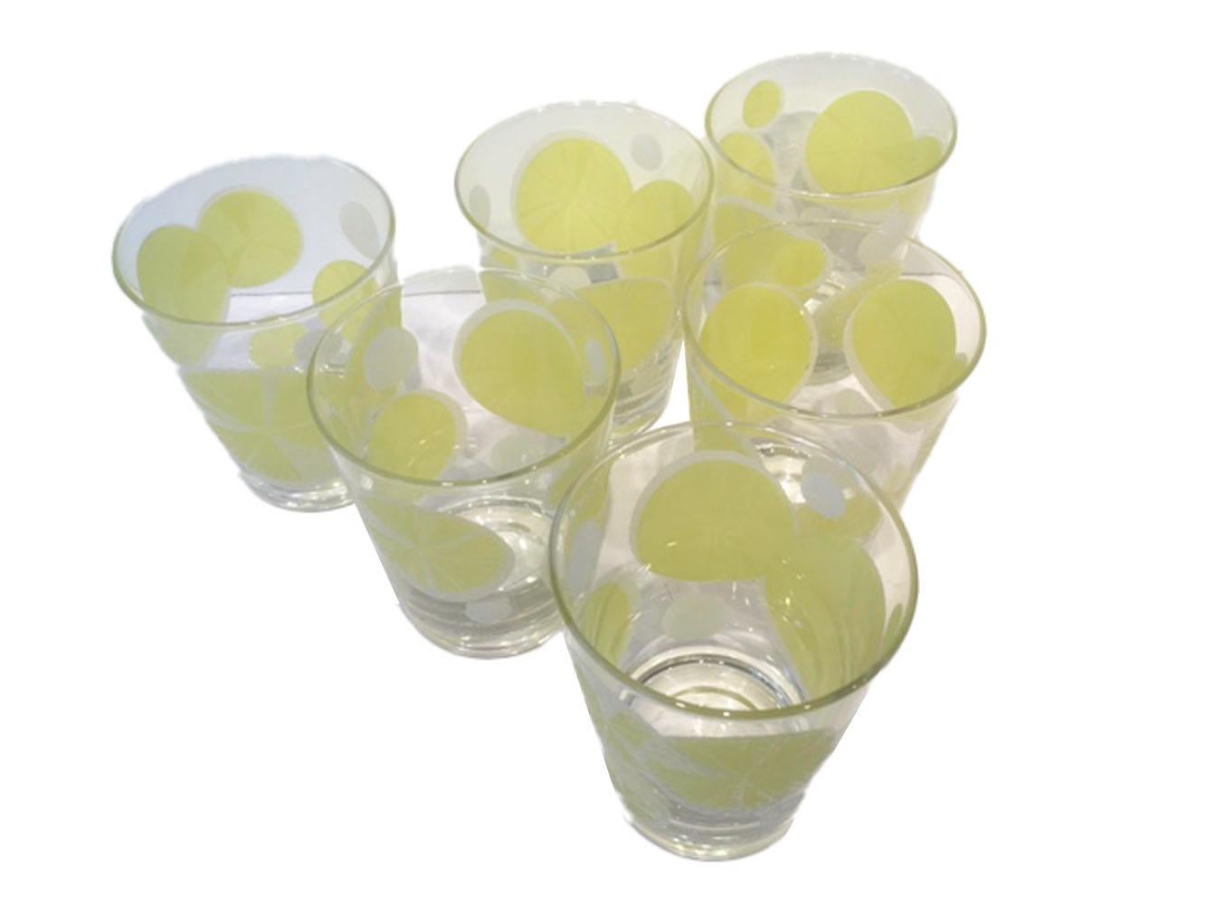 Vintage set of six double old fashioned glasses signed Fred Press. Decorated with raised 'sugaring' in yellow and white lemon slices on clear tapered glasses.