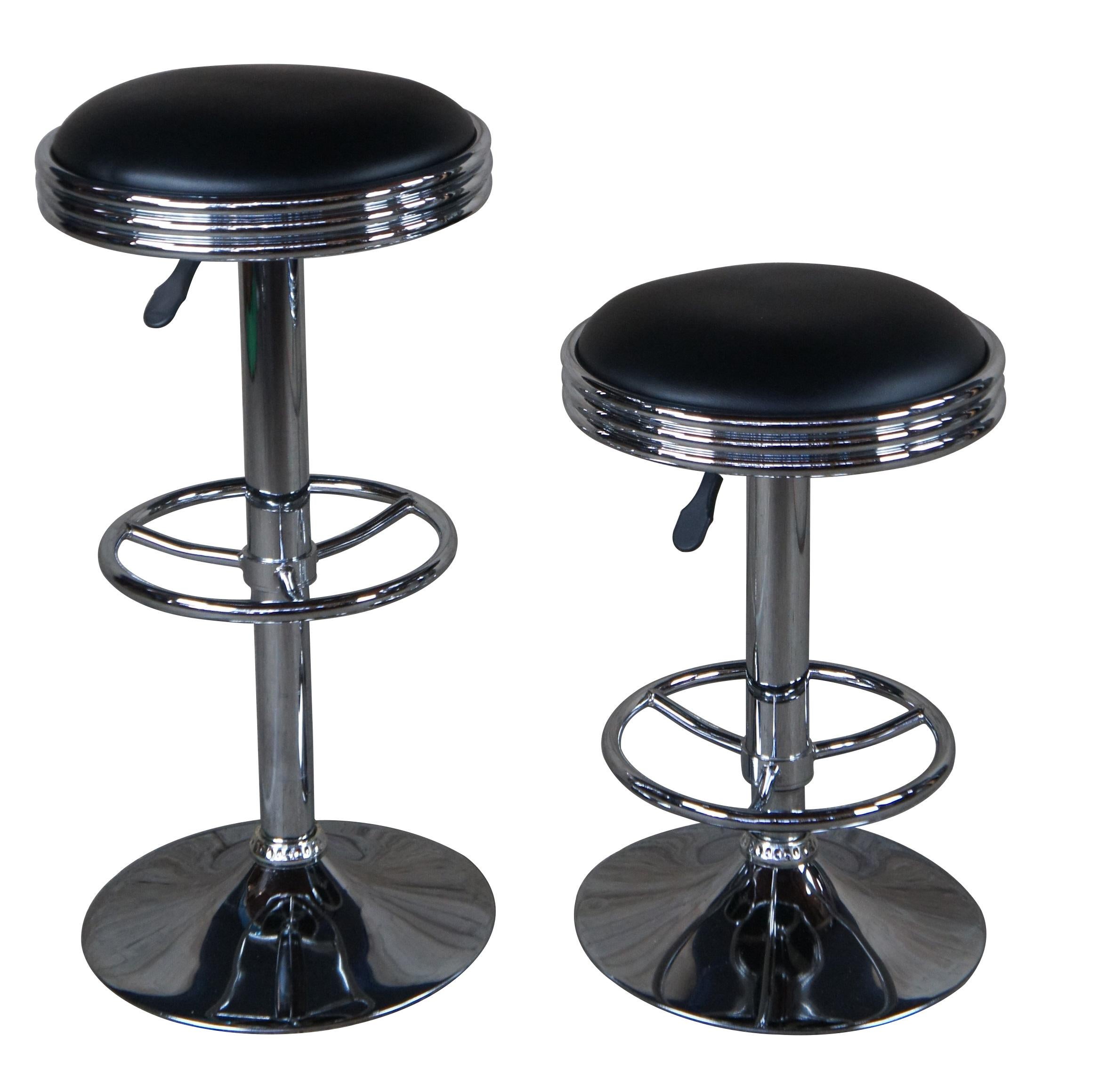 Six vintage adjustable swivel counter or bar stools featuring a 1950s diner vibe with circular black seat and tubular chrome frame.

Dimensions:
16