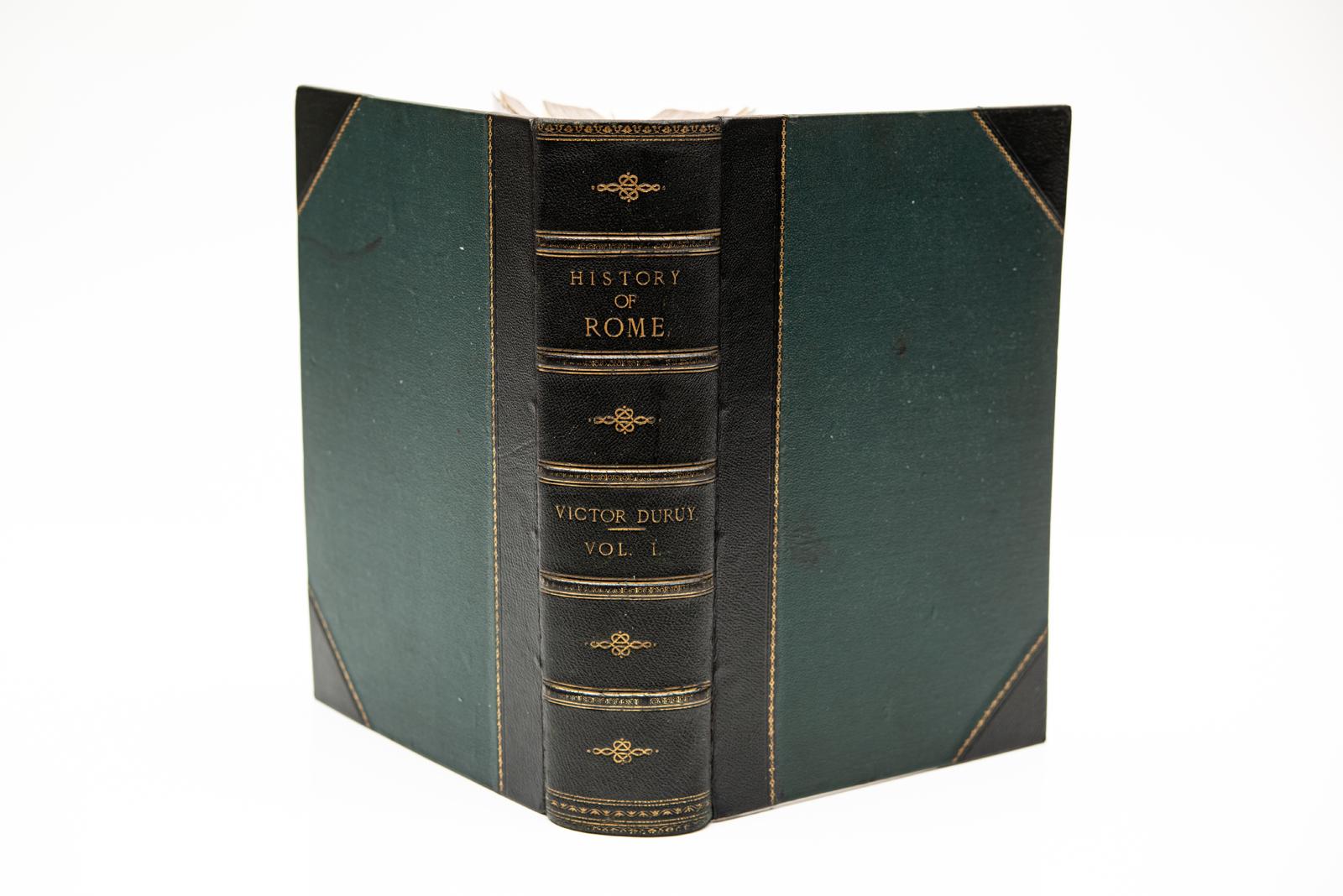 6 Vols. Victor Duruy. History of Rome and The Roman People from its Origin to The Establishment of The Christian Empire. Illustrated with 2500 engravings, 100 colored maps and numerous chromo-lithographs. Bound in 3/4 green morocco, linen boards,
