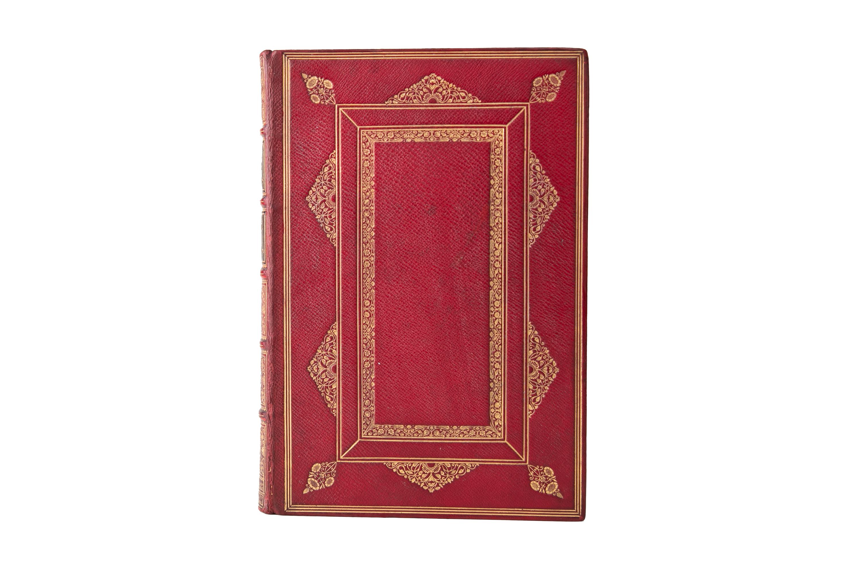 6 Volumes. Edmund Lodge, Portraits of Illustrious Personages of Great Britain. Bound in full red morocco. The Covers and raised band spines display ornate gilt-tooling with black morocco labels. All edges are gilt with gilt-tooled turn-ins.