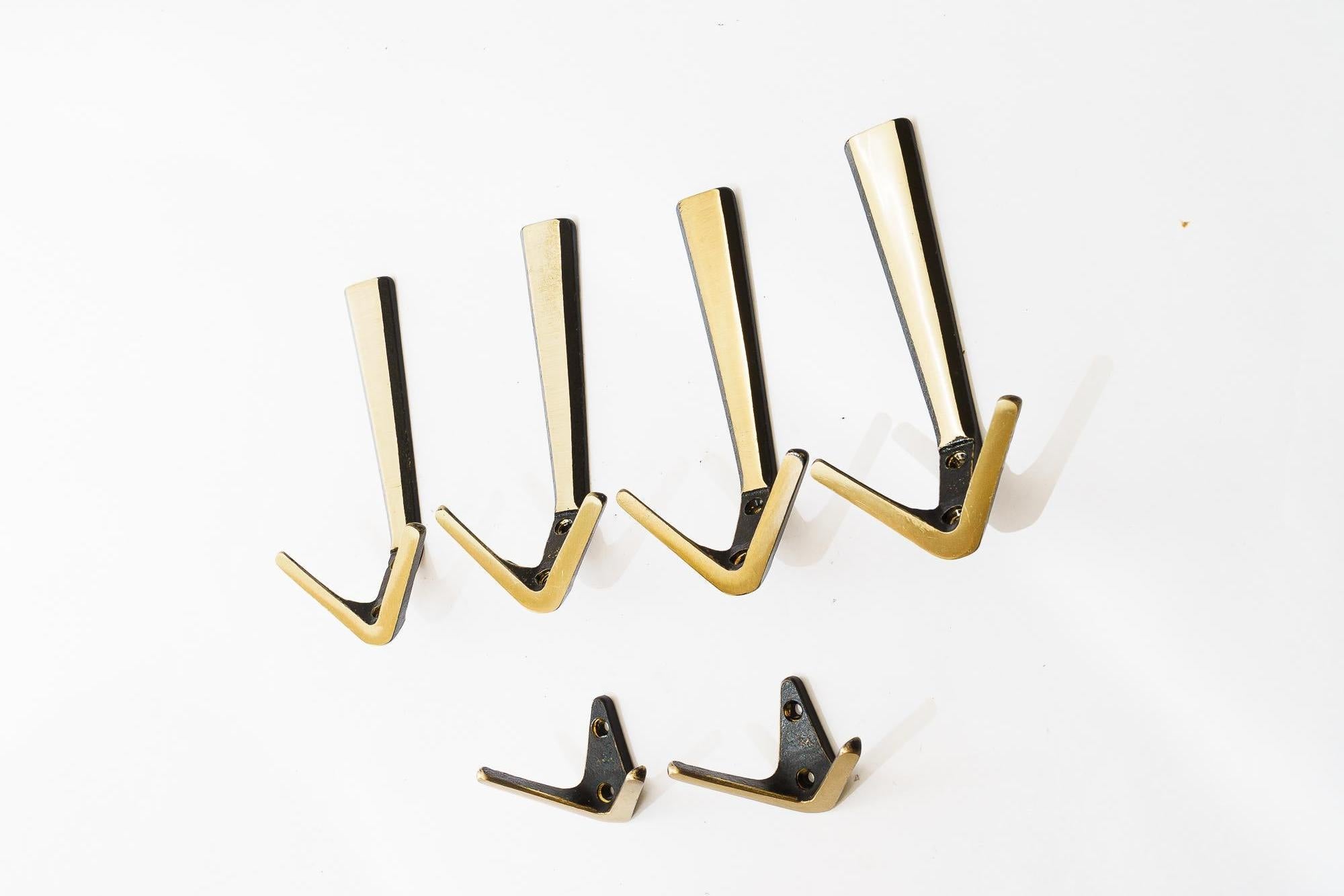 6 Wall Hooks by Herta Baller, around 1950s
Original condition
Size hooks bigger one: 
H: 15.5cm
W: 7.5cm
D: 7.5cm

Size smaller one:
H: 5cm
W: 7.5cm
D: 4cm
